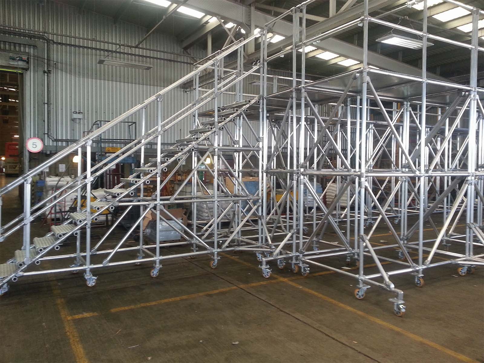 Mobile stairs system with handrails providing safe portable access to elevated work areas