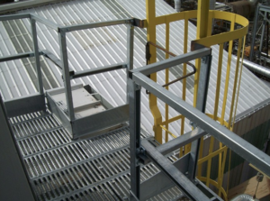 This enclosed ladder up to a roof walk system is an excellent safety system.