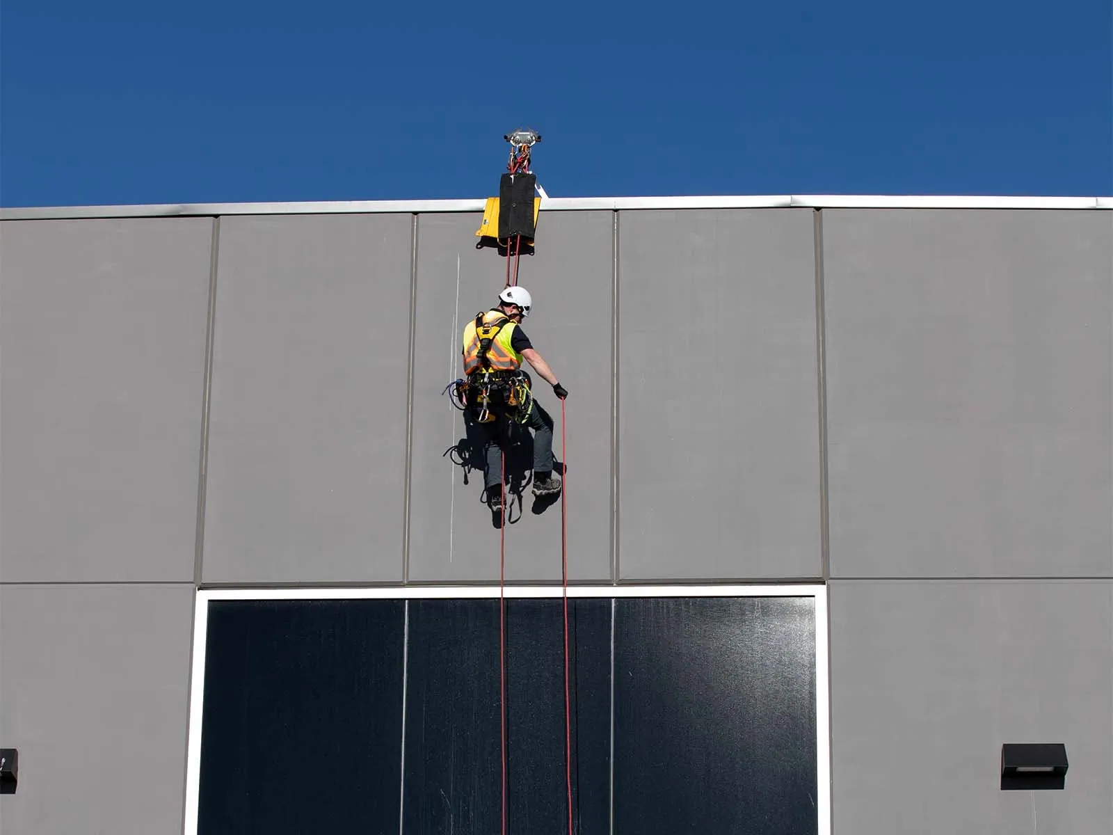 Fall protection guardrail system installed on commercial building rooftop