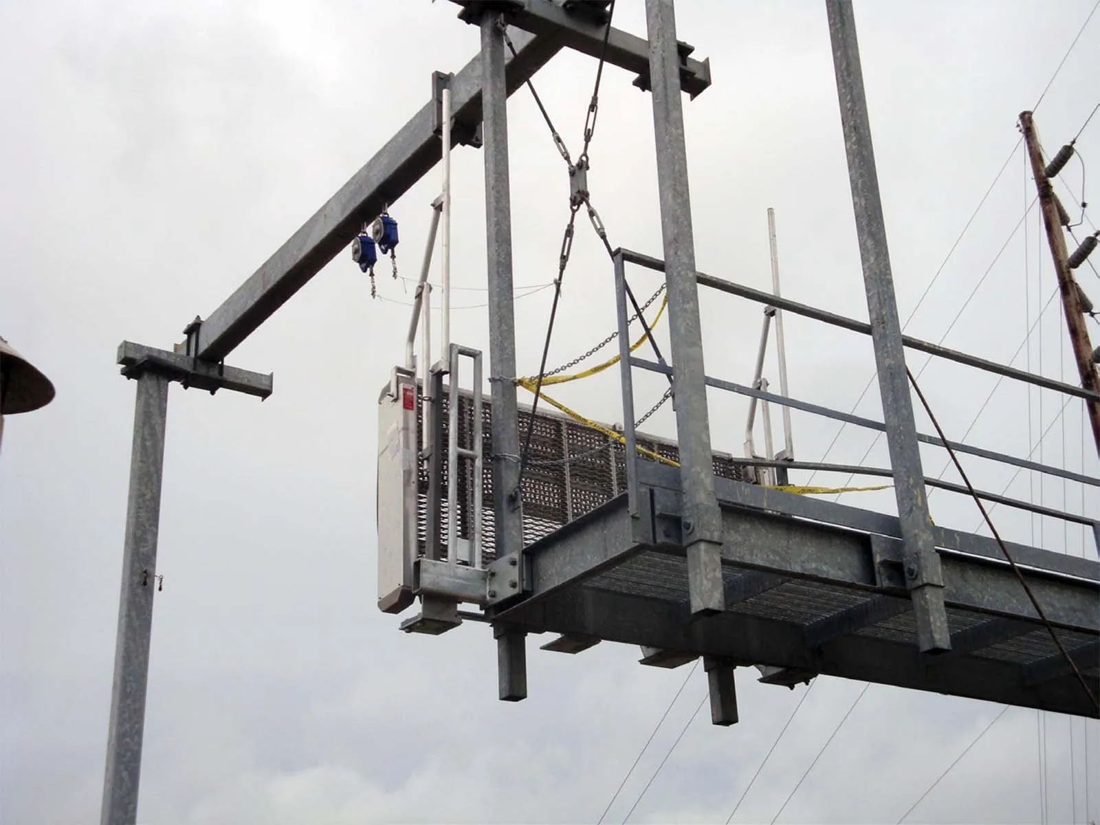 Dropdown gangway system installed for safe access between platforms and vehicles