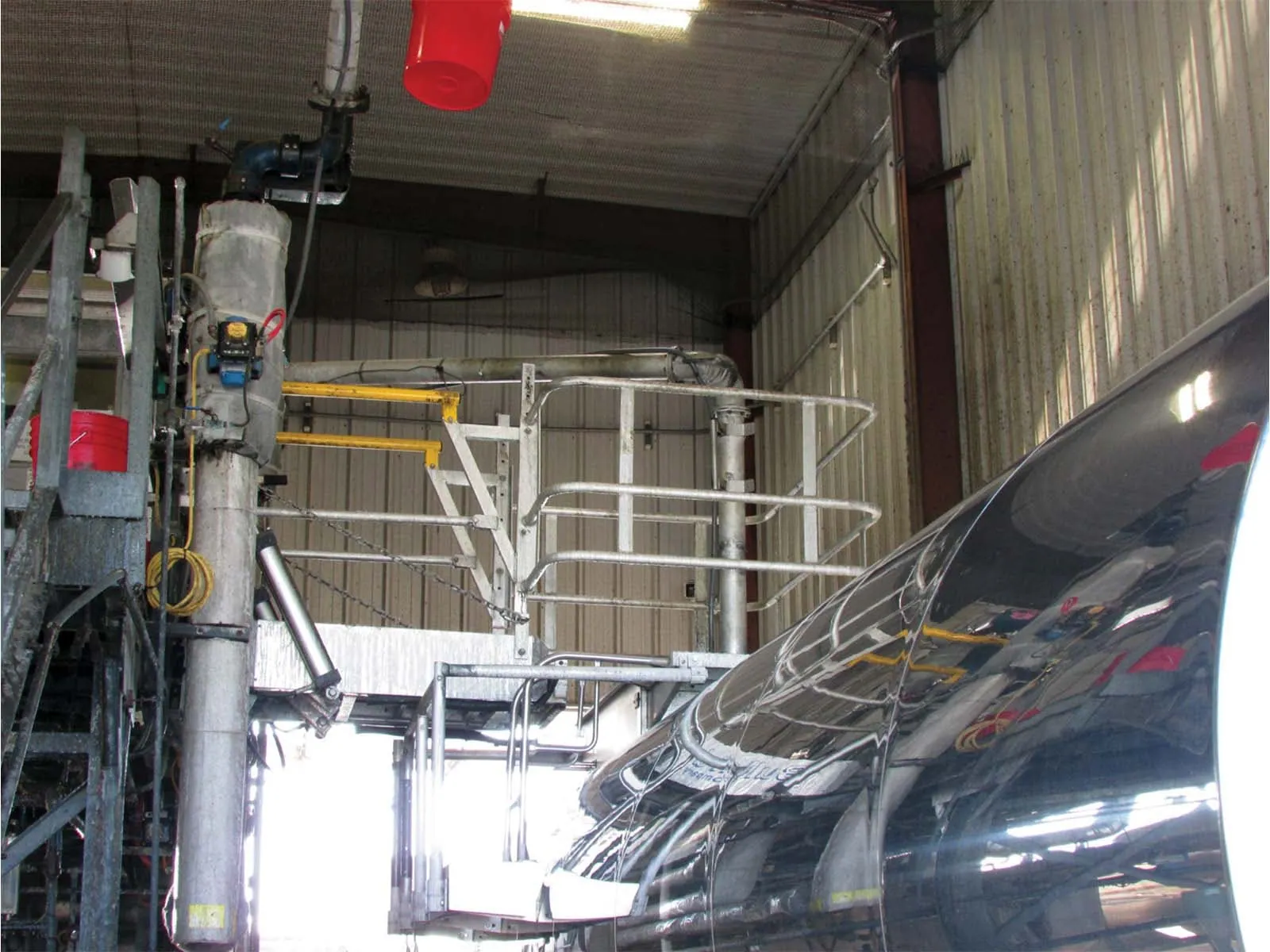 Dropdown gangway system installed for safe access between platforms and vehicles