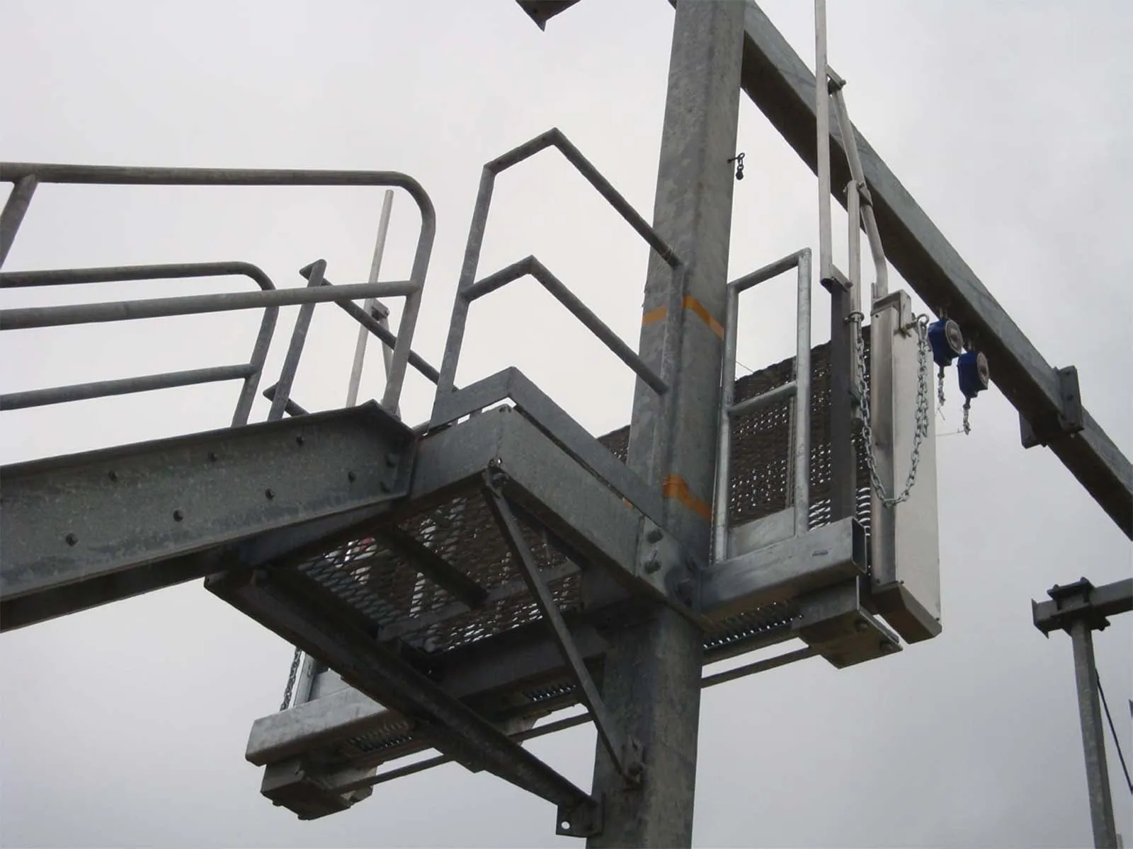 Dropdown gangway system installed for safe access between platforms and vehicles