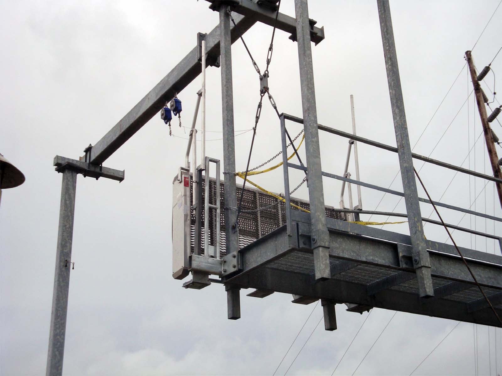 Dropdown gangway system installed for safe access between platforms and vehicles