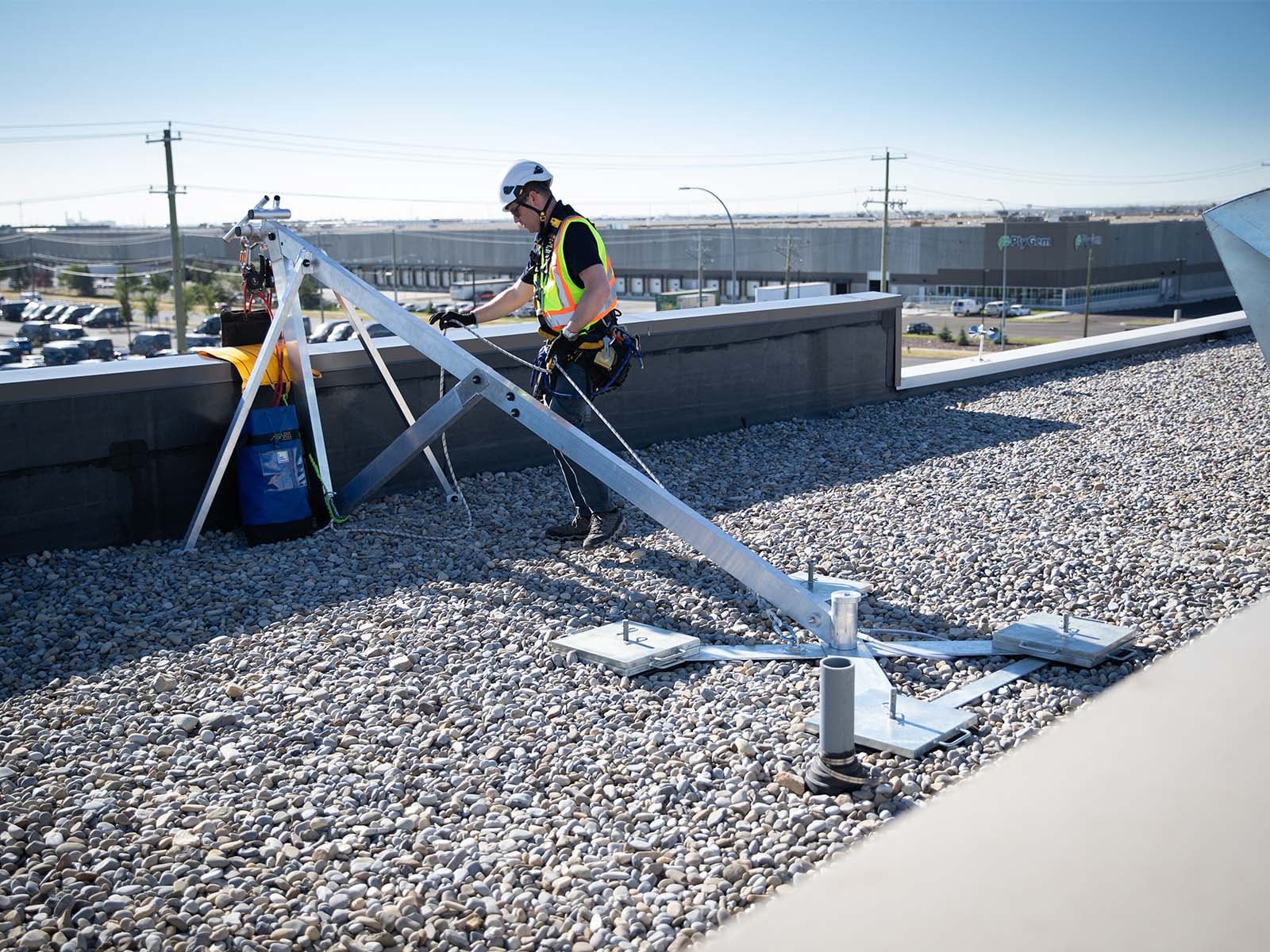 Fall protection system installed for safe access to building facade during maintenance