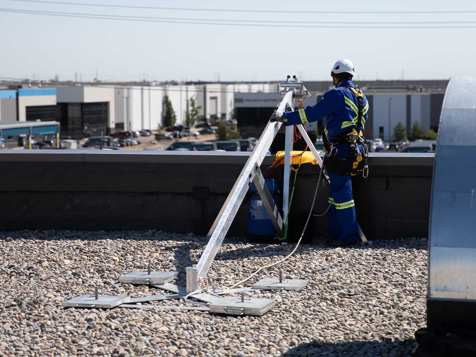 Fall protection system installed for safe access to building facade during maintenance