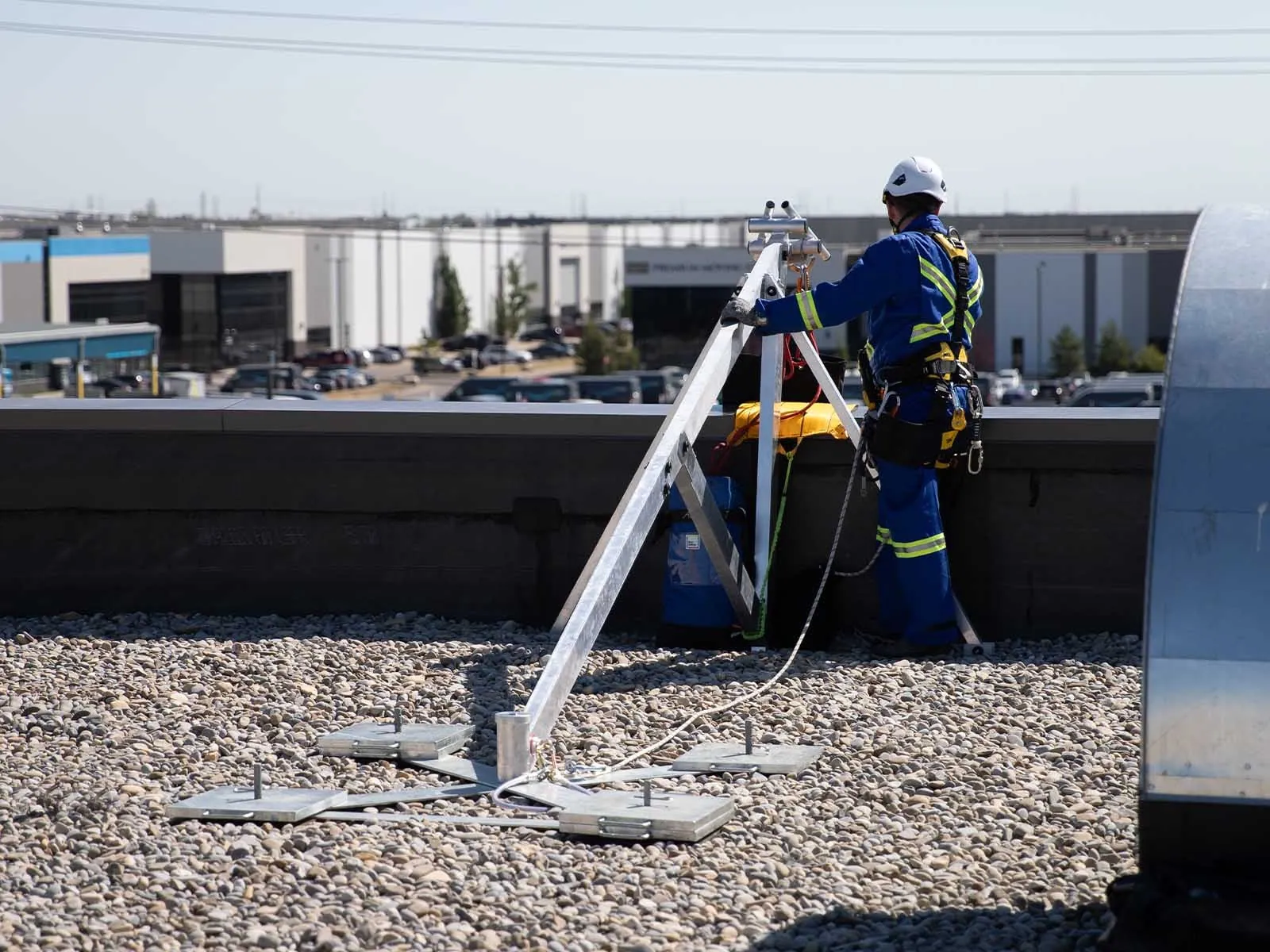Fall protection system installed for safe access to building facade during maintenance