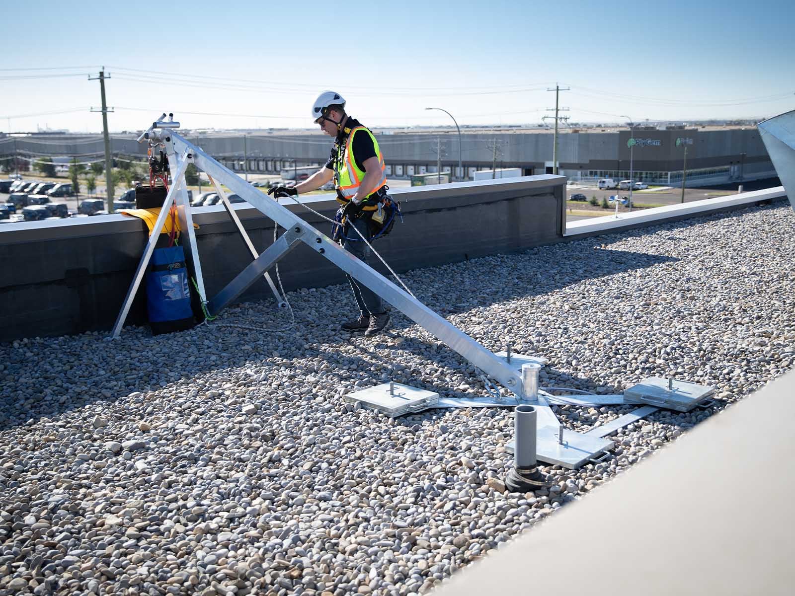 Fall protection system installed for safe access to building facade during maintenance