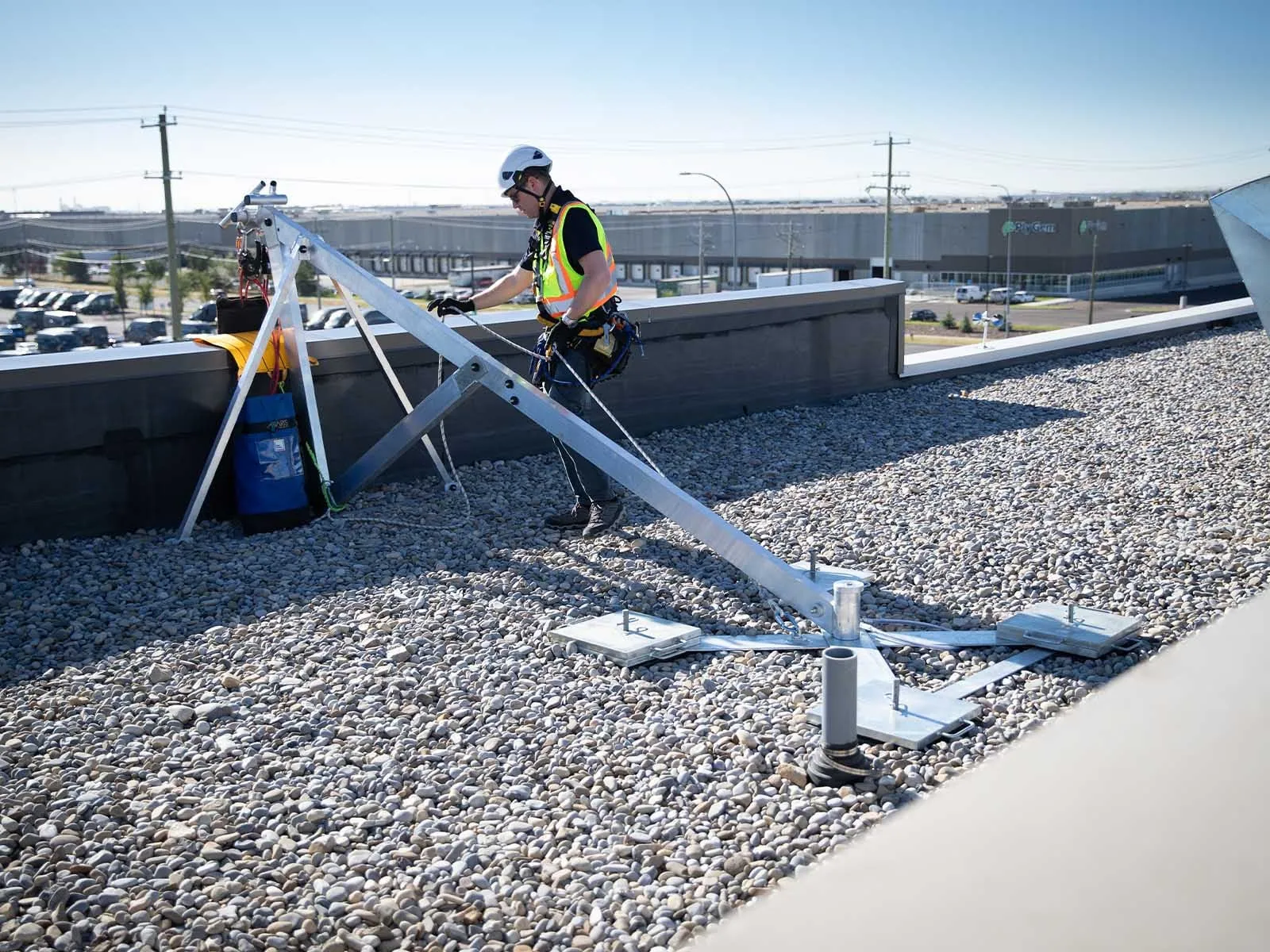 Fall protection system installed for safe access to building facade during maintenance