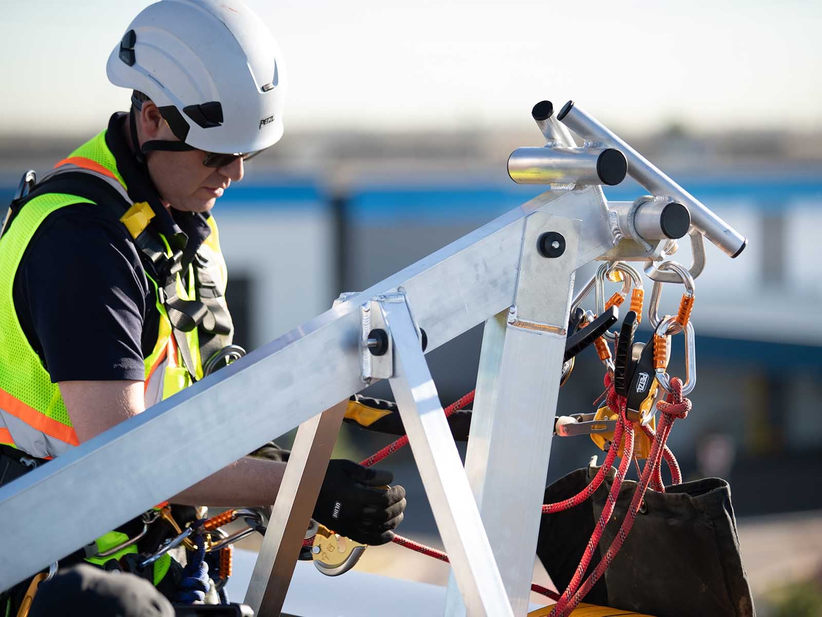 Fall protection system installed for safe access to building facade during maintenance