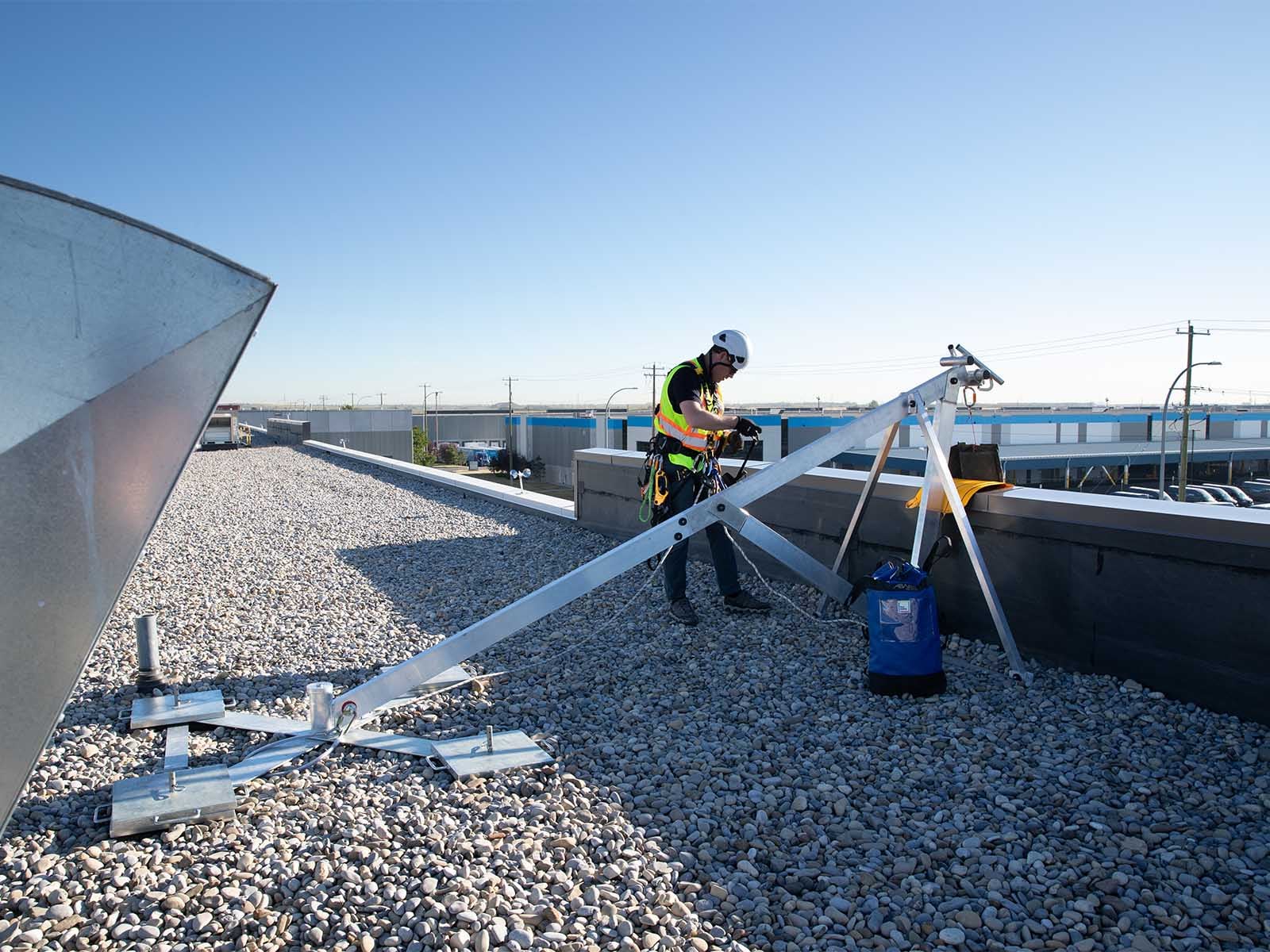 Fall protection system installed for safe access to building facade during maintenance