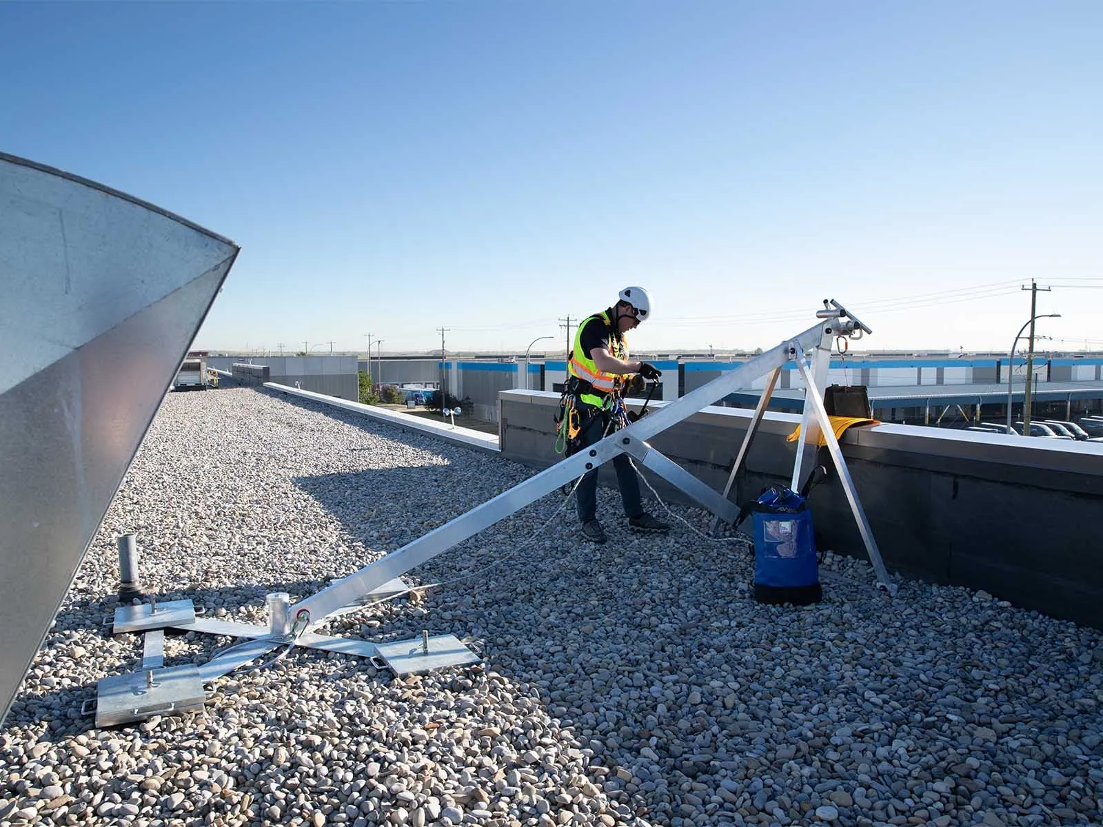 Fall protection system installed for safe access to building facade during maintenance