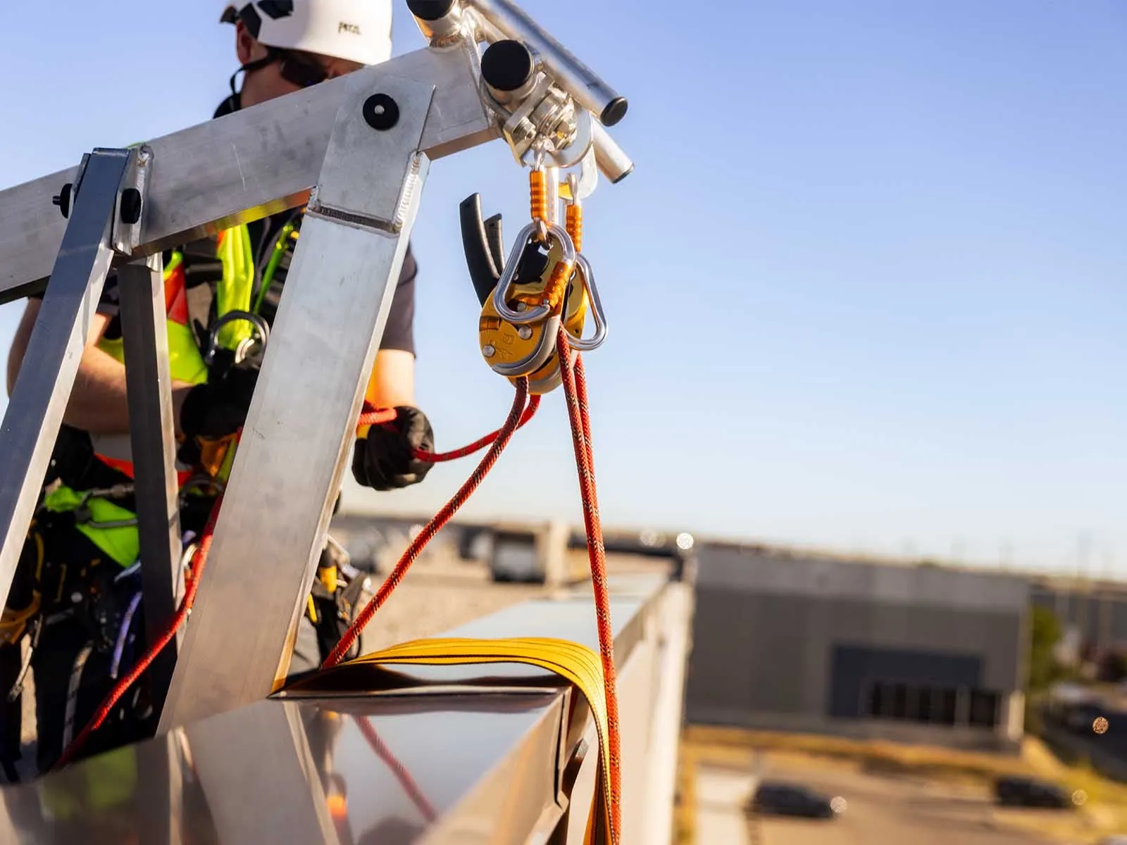 Fall protection system installed for safe access to building facade during maintenance