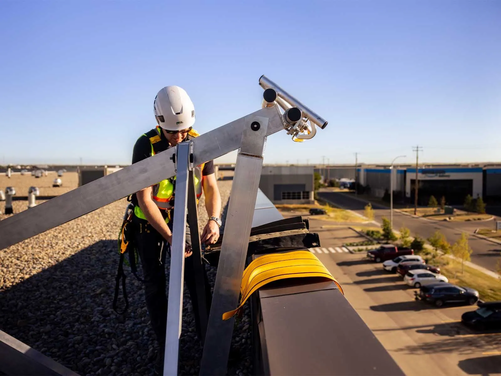 Fall protection system installed for safe access to building facade during maintenance