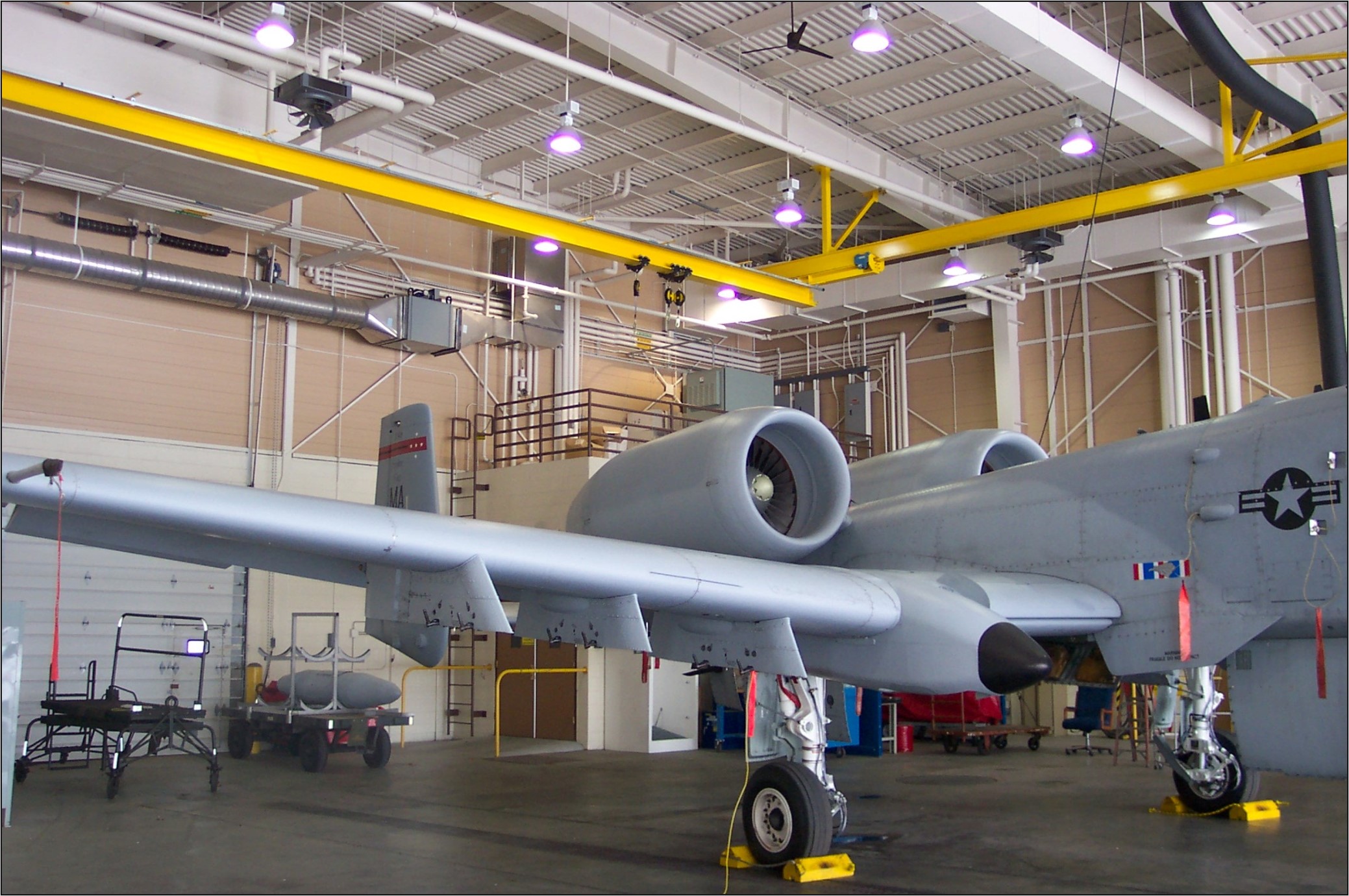 Floating bridge system providing safe access in aircraft hangar