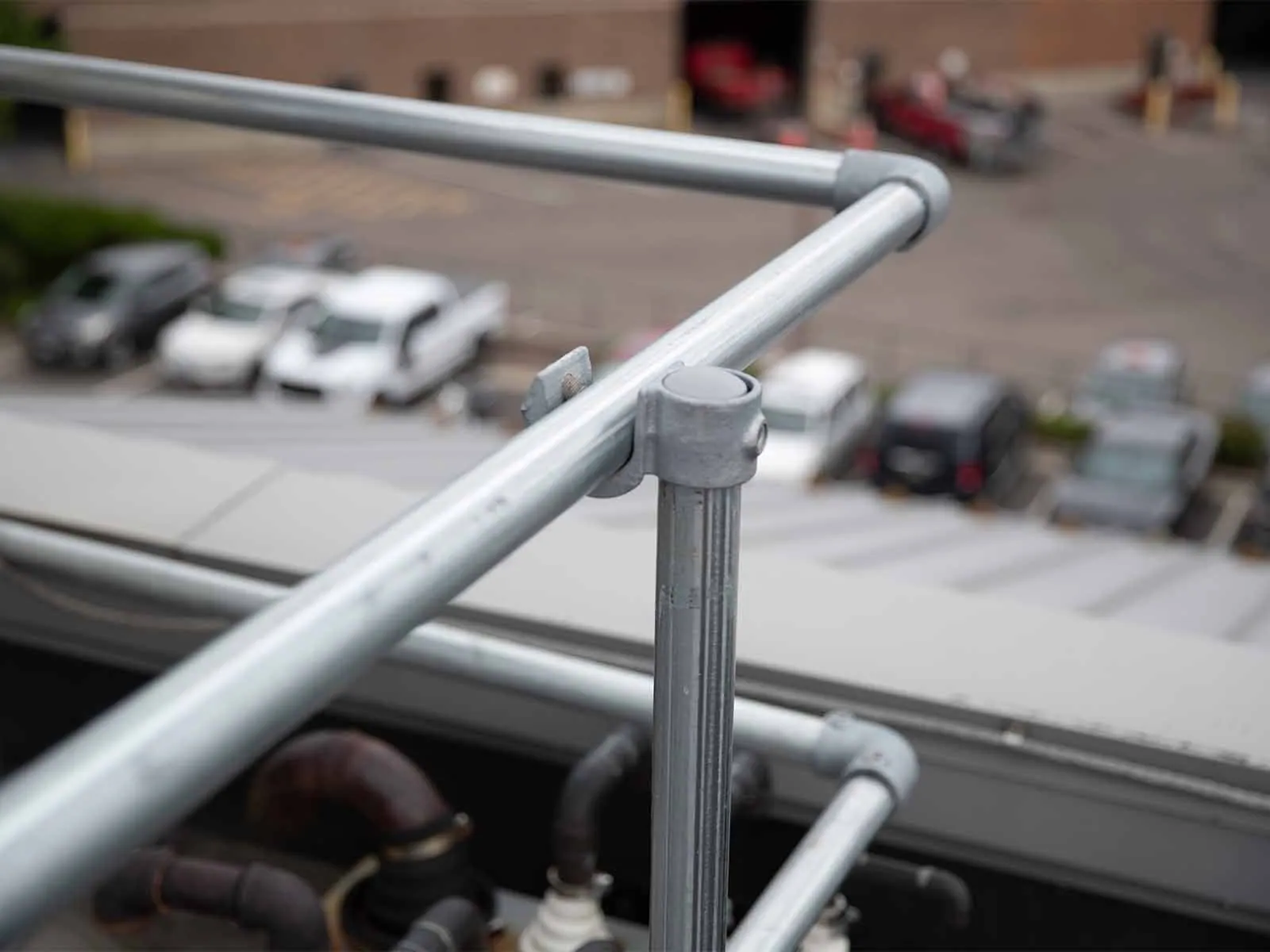 Freestanding roof guardrail system installed on flat commercial rooftop for fall protection