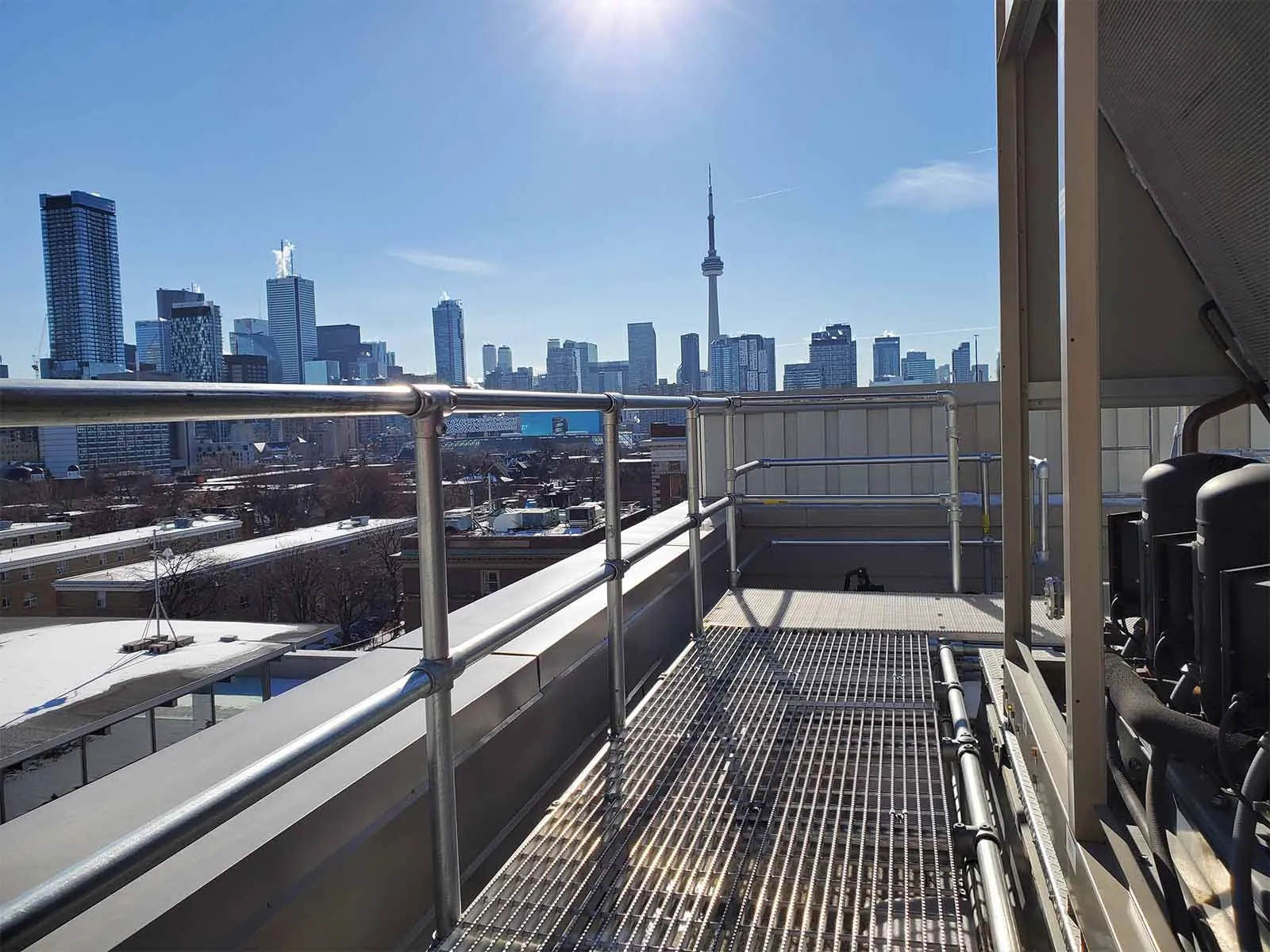 Freestanding roof guardrail system installed on flat commercial rooftop for fall protection
