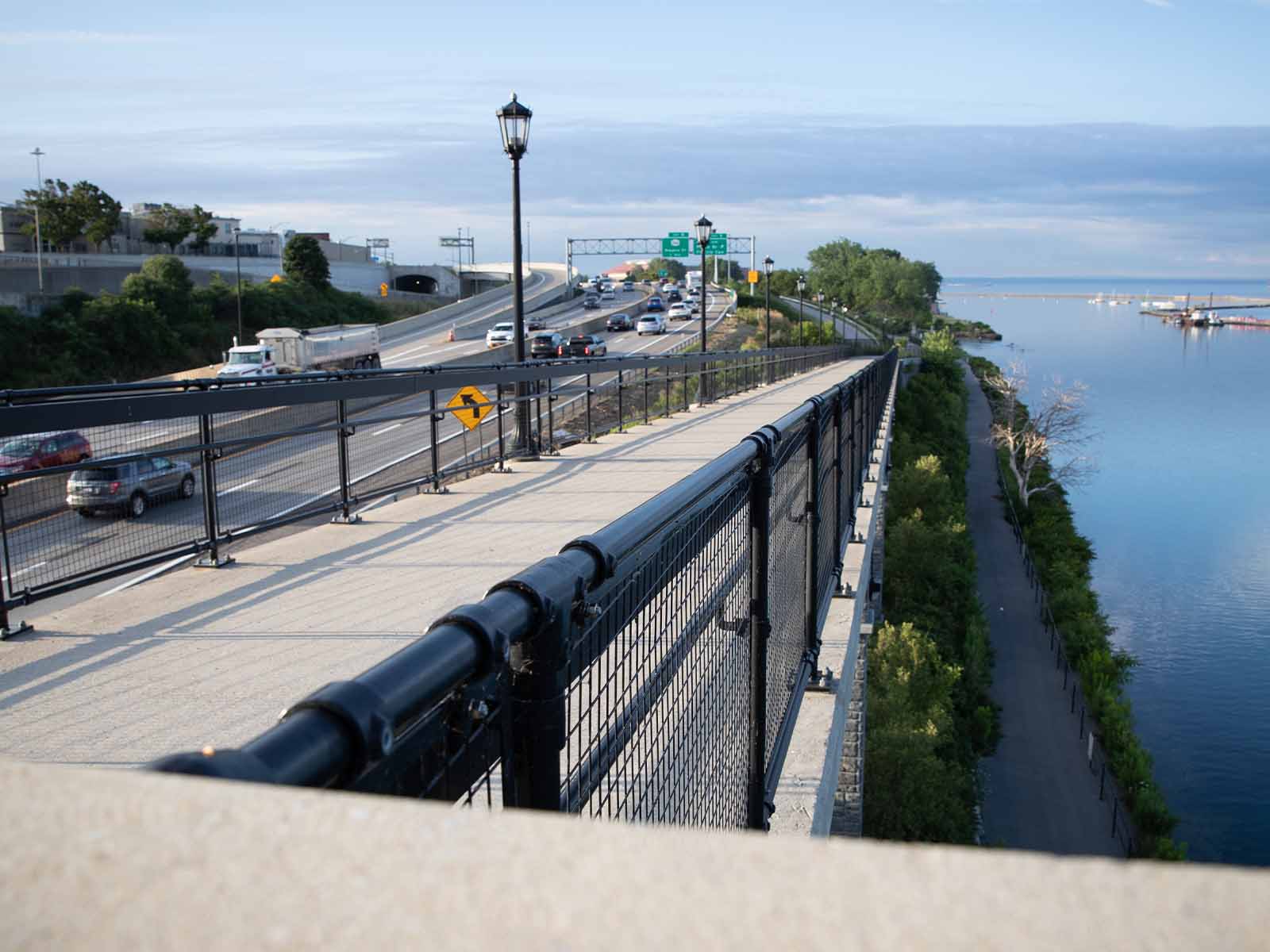 Ground-based guardrail system installed to provide fall protection at elevated work areas