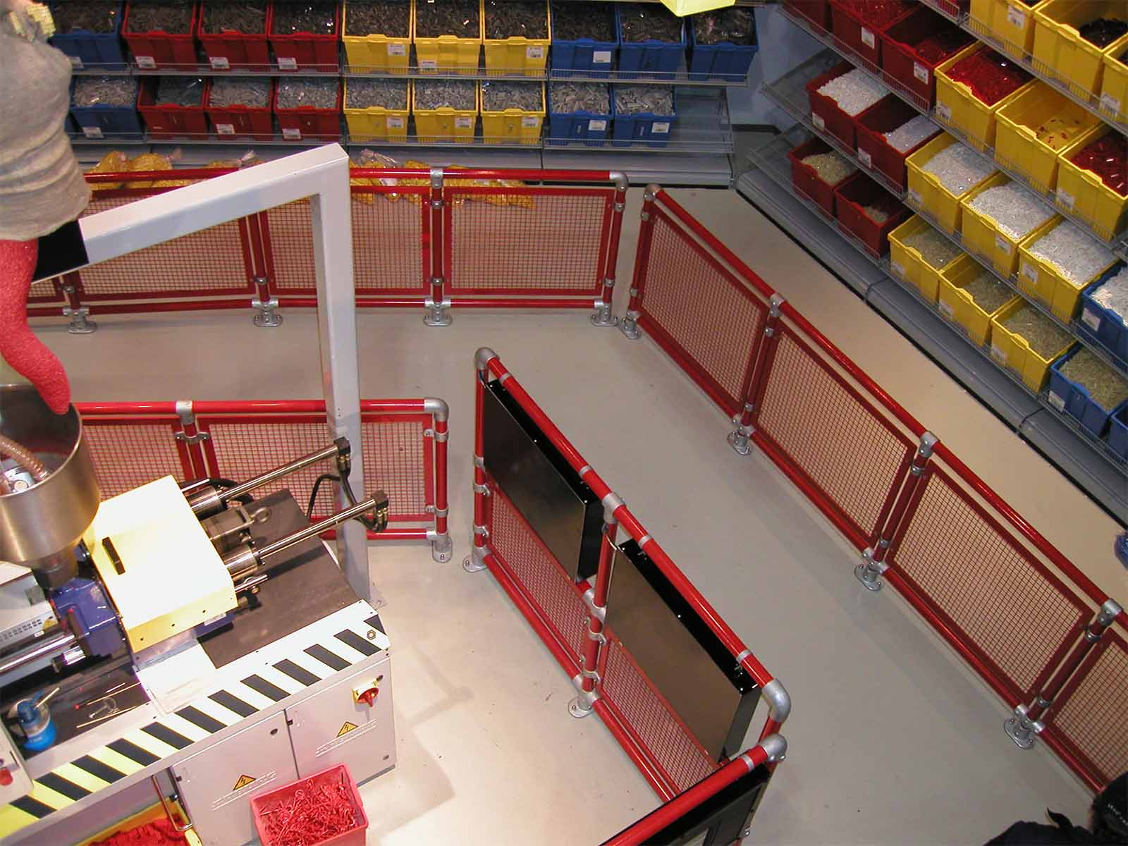 Ground-based guardrail system installed to provide fall protection at elevated work areas