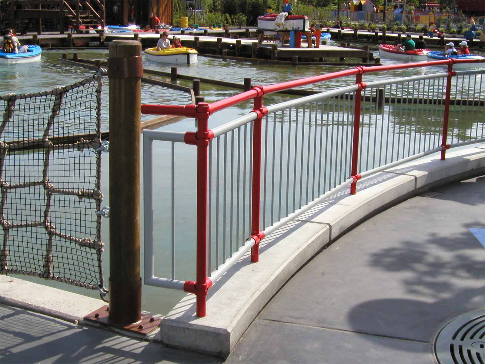 Ground-based guardrail system installed to provide fall protection at elevated work areas