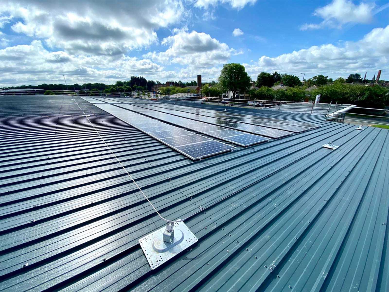 Horizontal lifeline system installed for continuous fall protection on rooftop