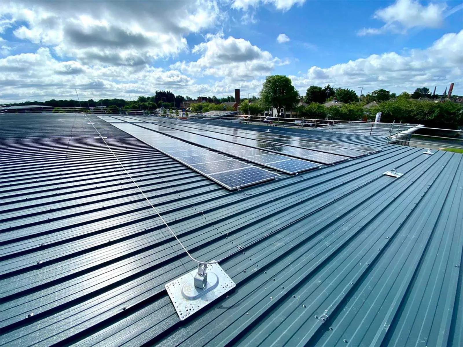 Horizontal lifeline system installed for continuous fall protection on rooftop