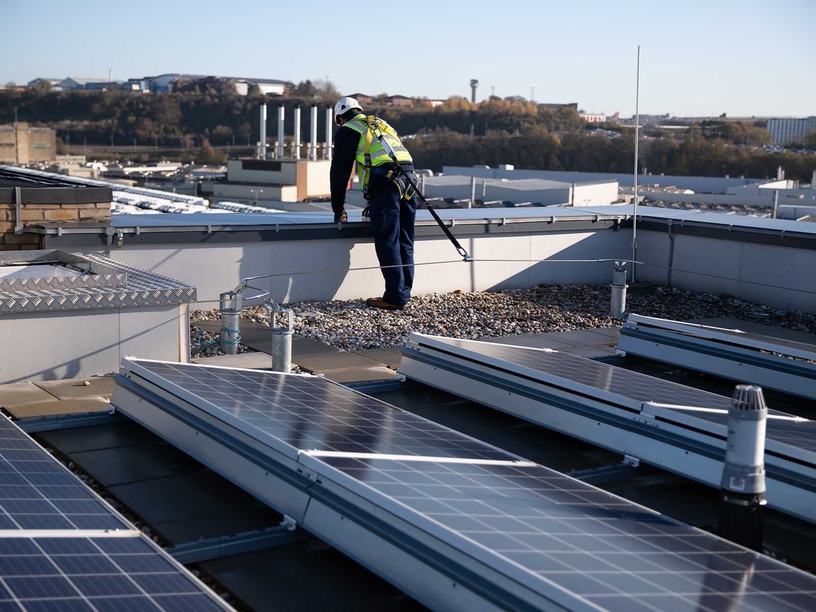 Horizontal lifeline system installed for continuous fall protection on rooftop