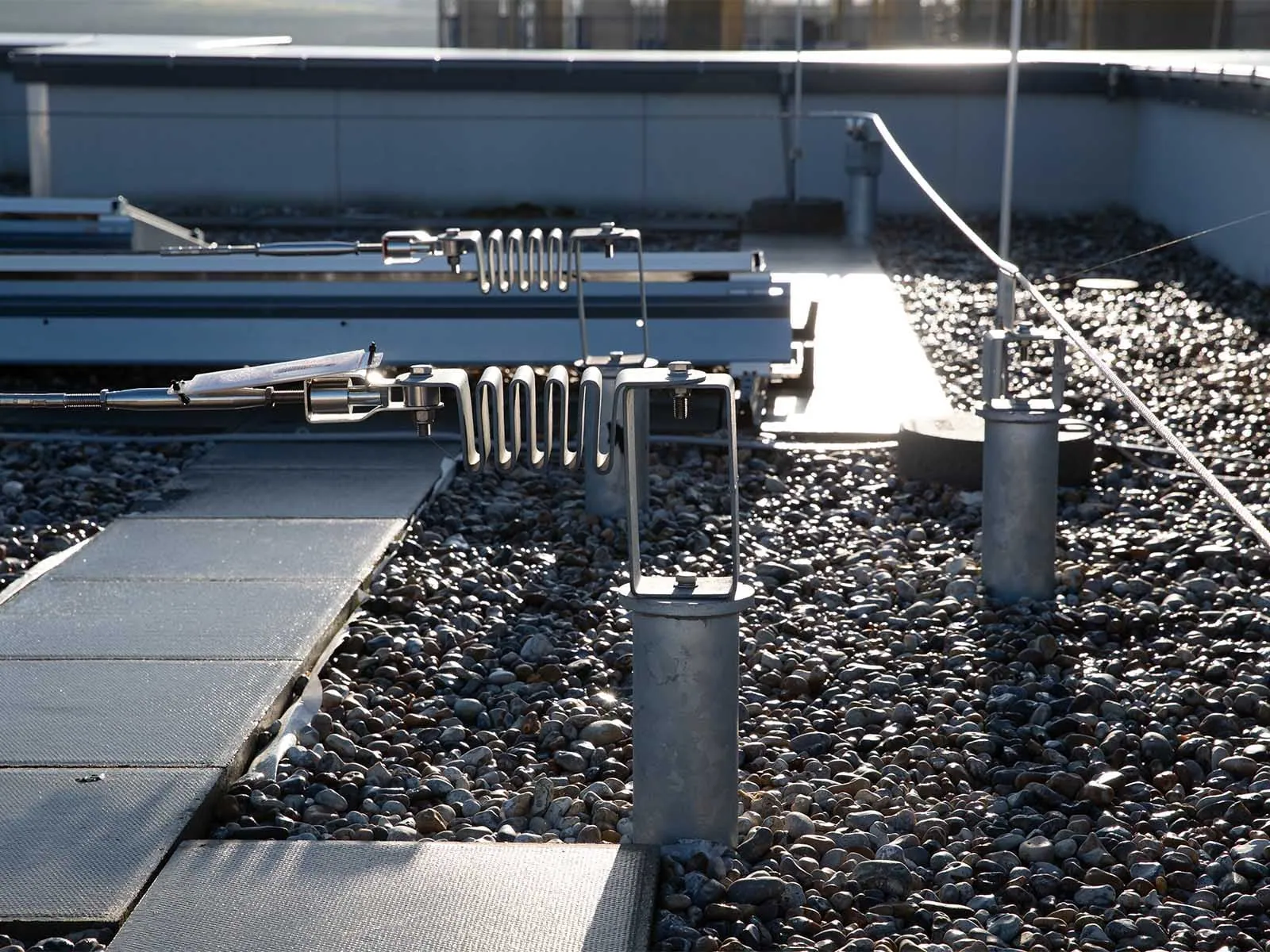 Horizontal lifeline system installed for continuous fall protection on rooftop