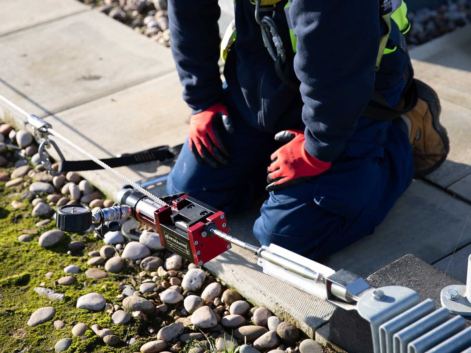 Horizontal lifeline system installed for continuous fall protection on rooftop