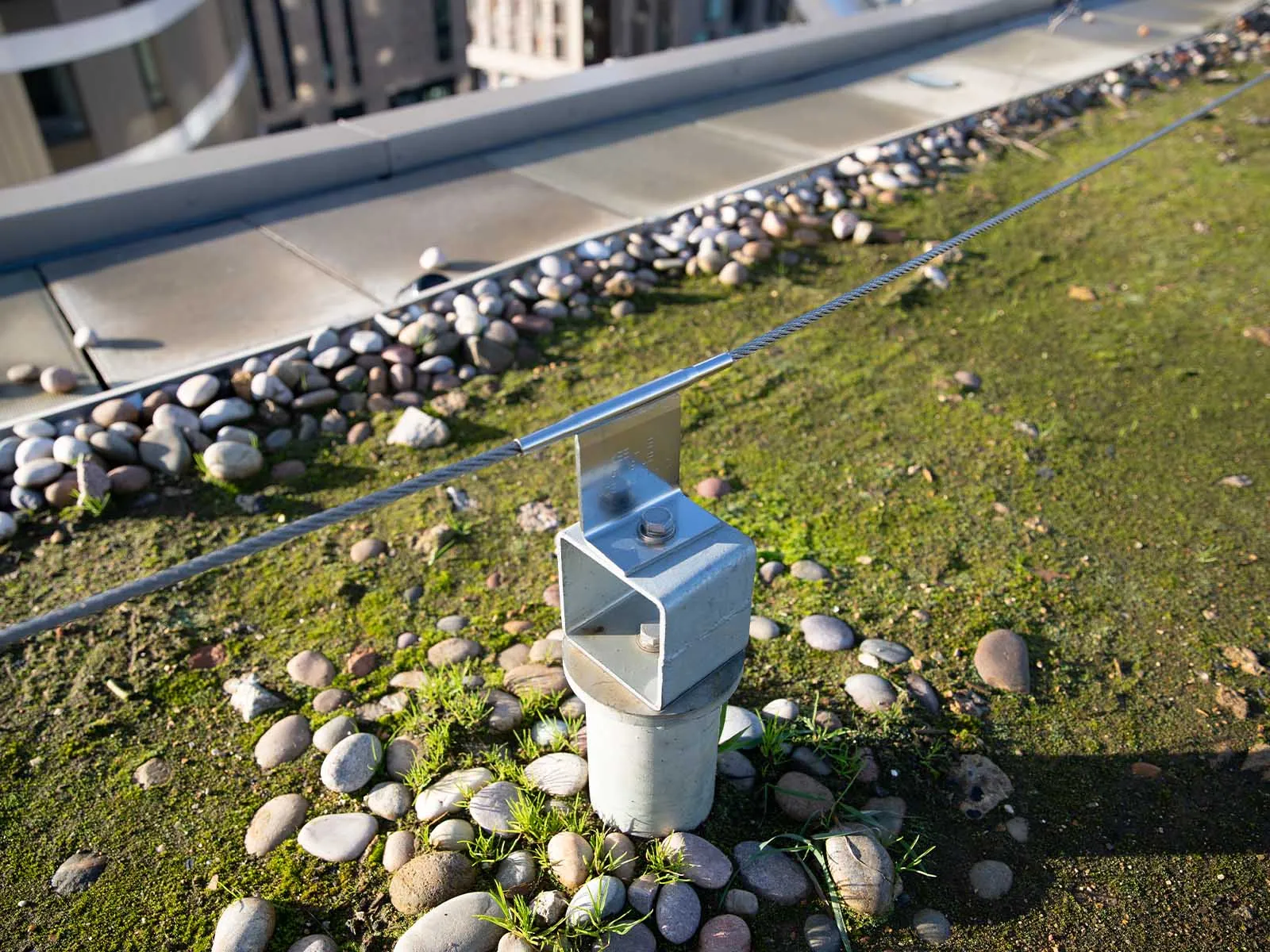 Horizontal lifeline system installed for continuous fall protection on rooftop