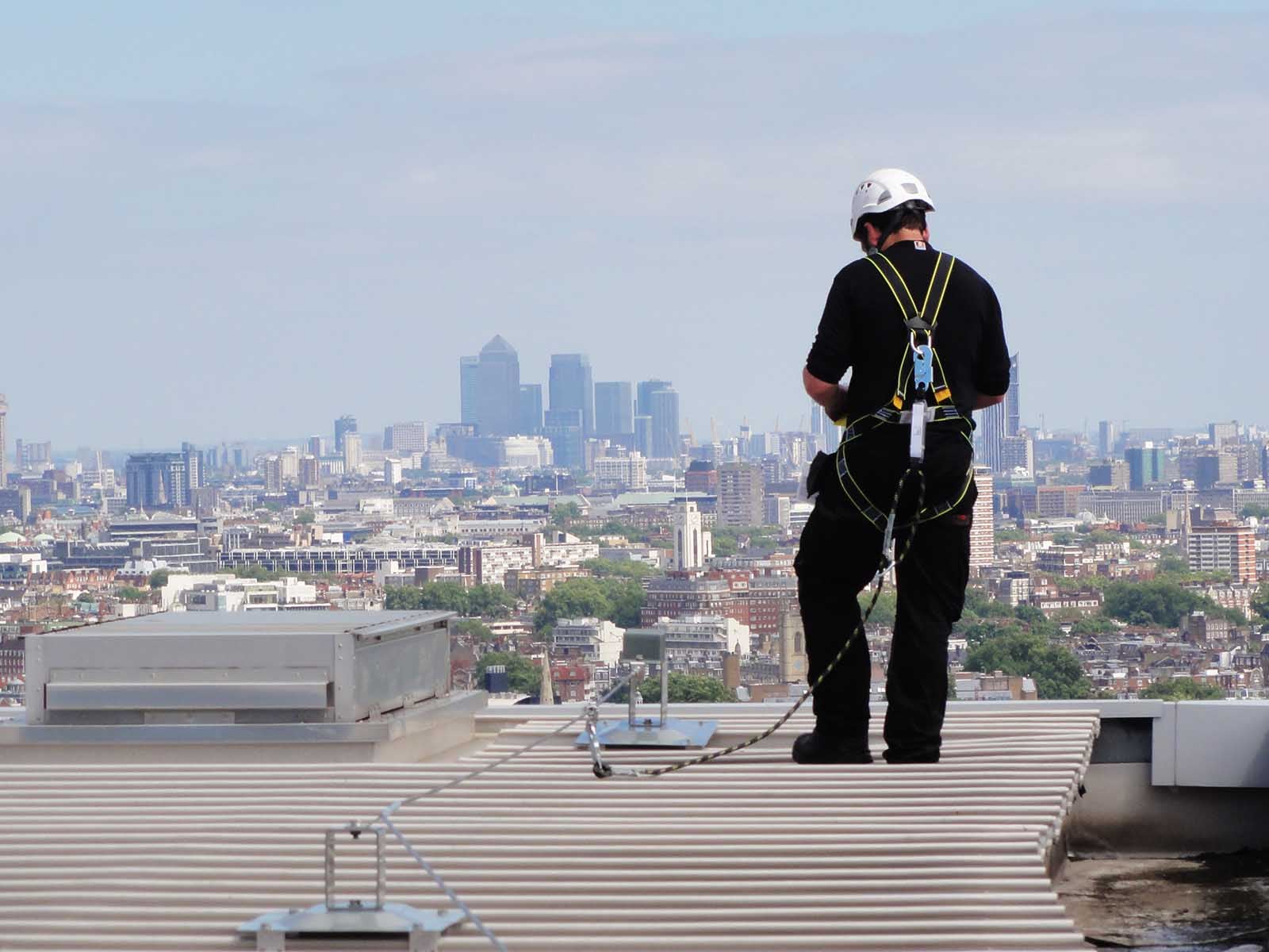 Horizontal lifeline system installed for continuous fall protection on rooftop