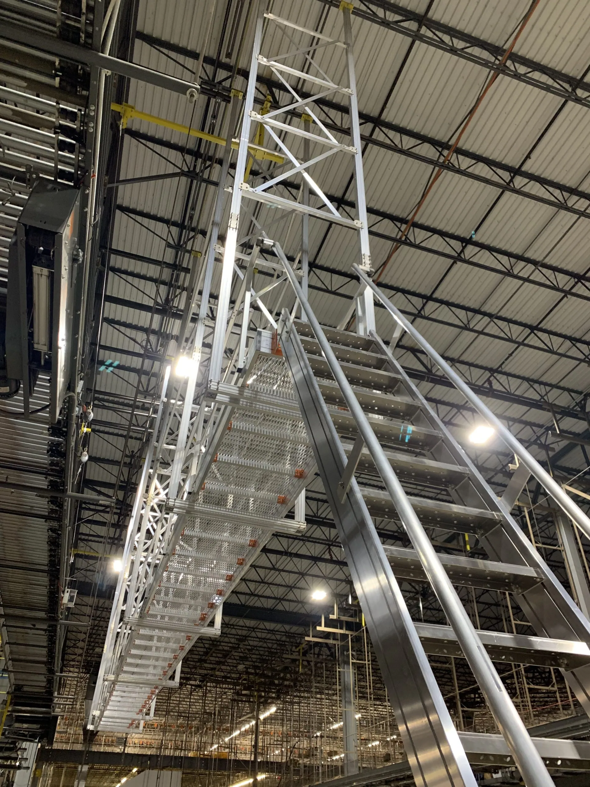 Fixed static platform providing elevated work access with guardrails