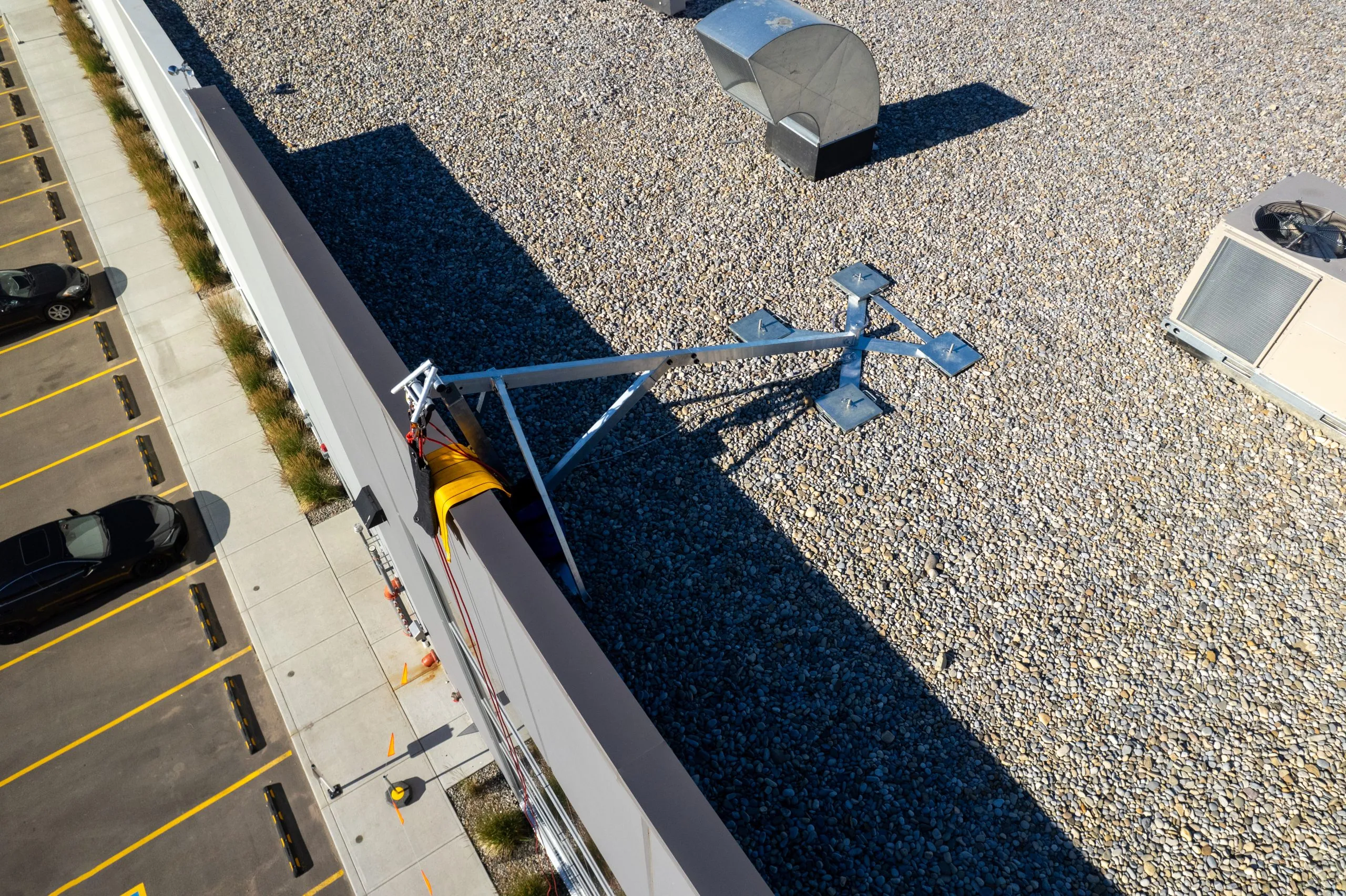 Non-penetrating rope access system used for safe vertical work at height