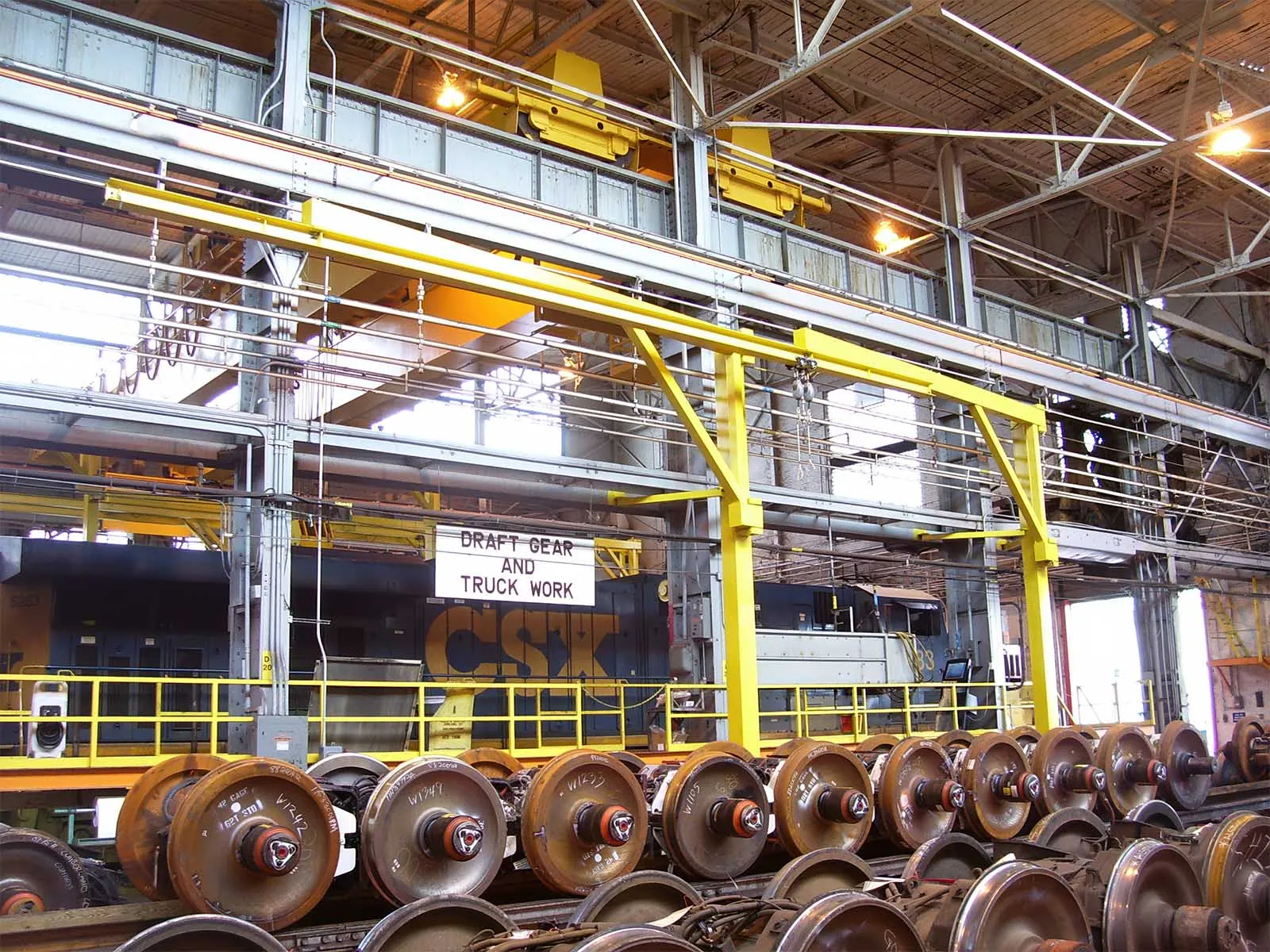 Engineered overhead crane system with integrated fall arrest safety features