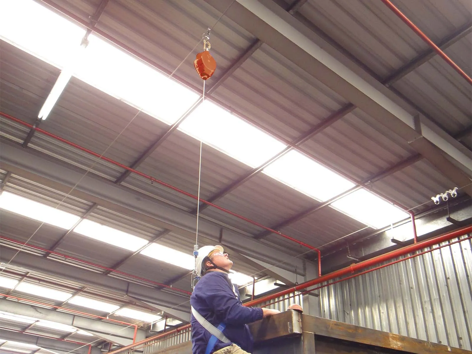 Overhead lifeline system installed for fall protection in industrial facility