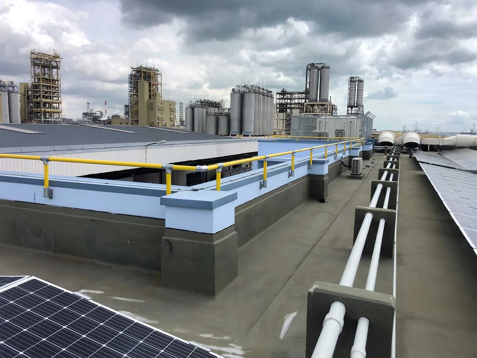 Parapet guardrail system installed on rooftop edge for fall protection