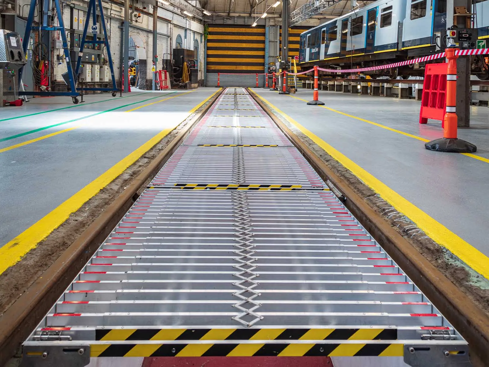 Heavy-duty pit cover installed to prevent falls in industrial maintenance areas