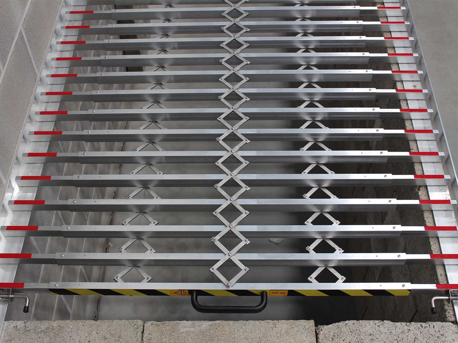 Heavy-duty pit cover installed to prevent falls in industrial maintenance areas
