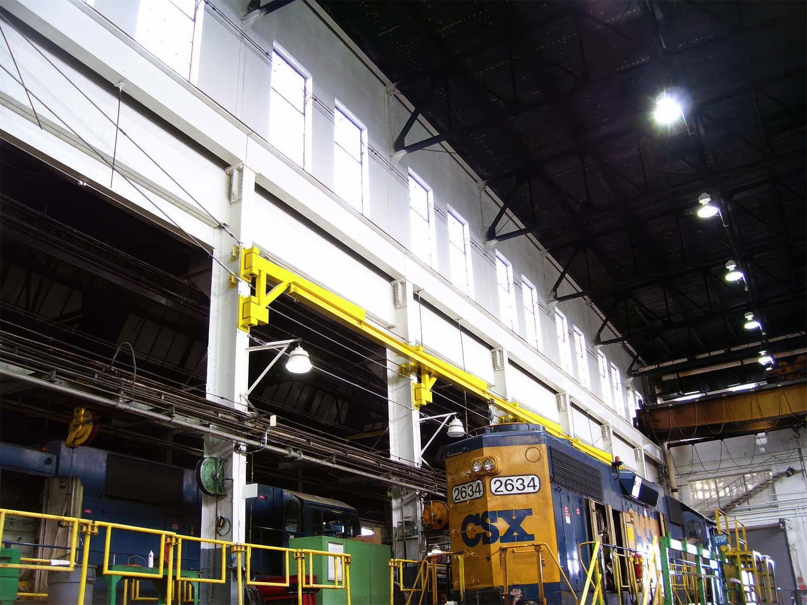 Rigid rail and lifeline systems designed for safe loading, unloading, and maintenance of transportation vehicles