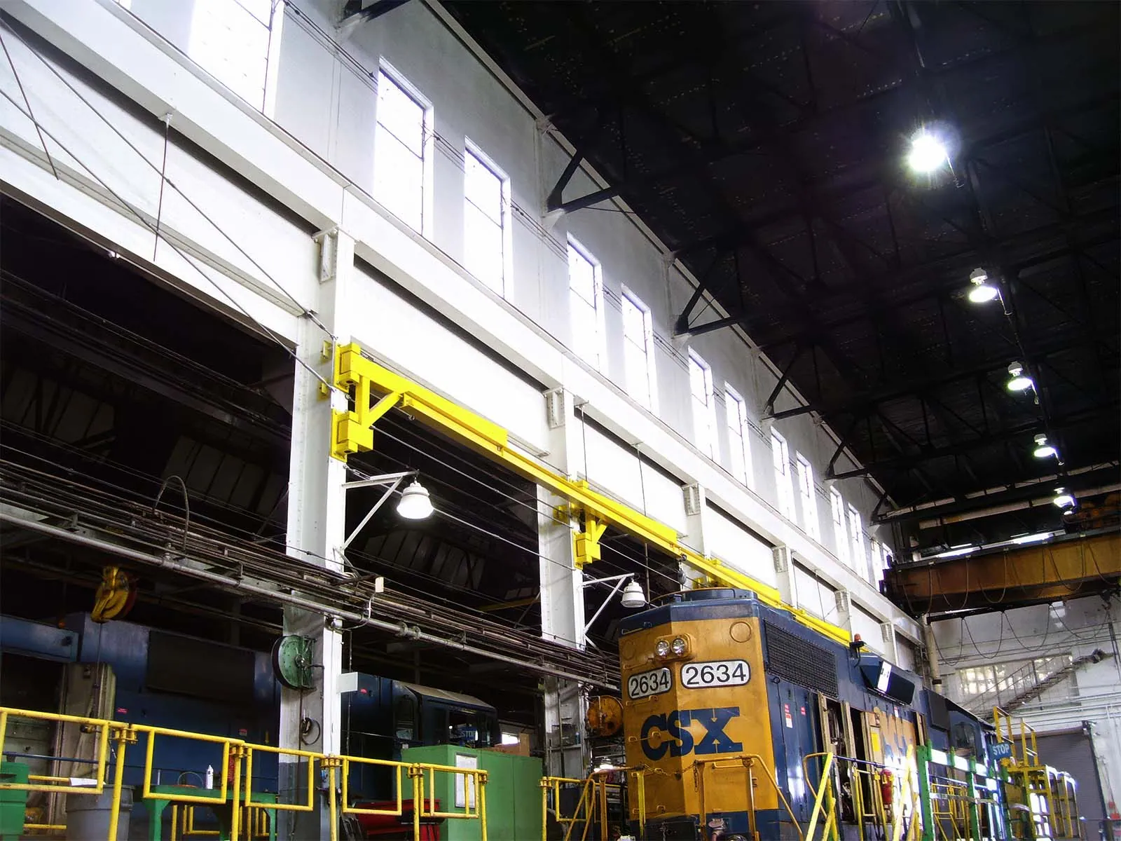 Rigid rail and lifeline systems designed for safe loading, unloading, and maintenance of transportation vehicles