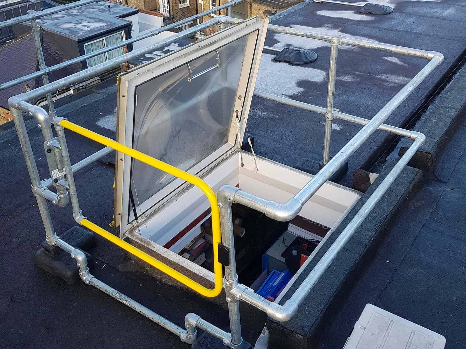 Self-closing safety gate installed for fall protection on elevated platforms and stairways