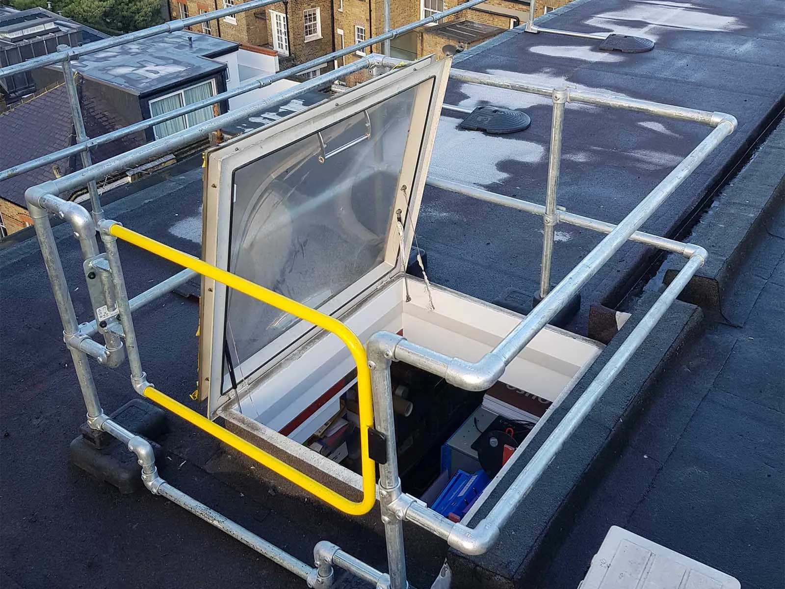 Self-closing safety gate installed for fall protection on elevated platforms and stairways