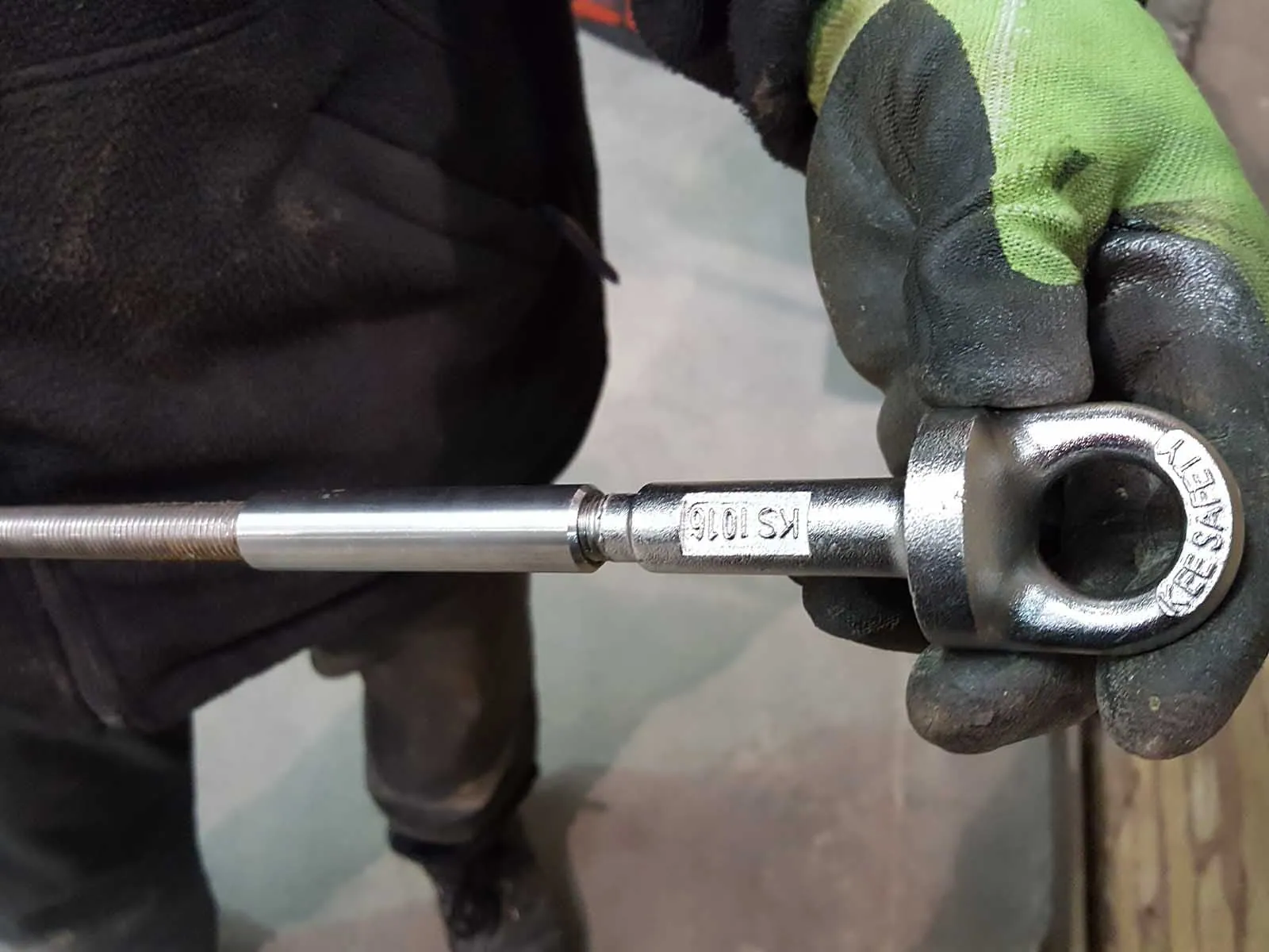 Single-point anchor installed for secure fall protection attachment