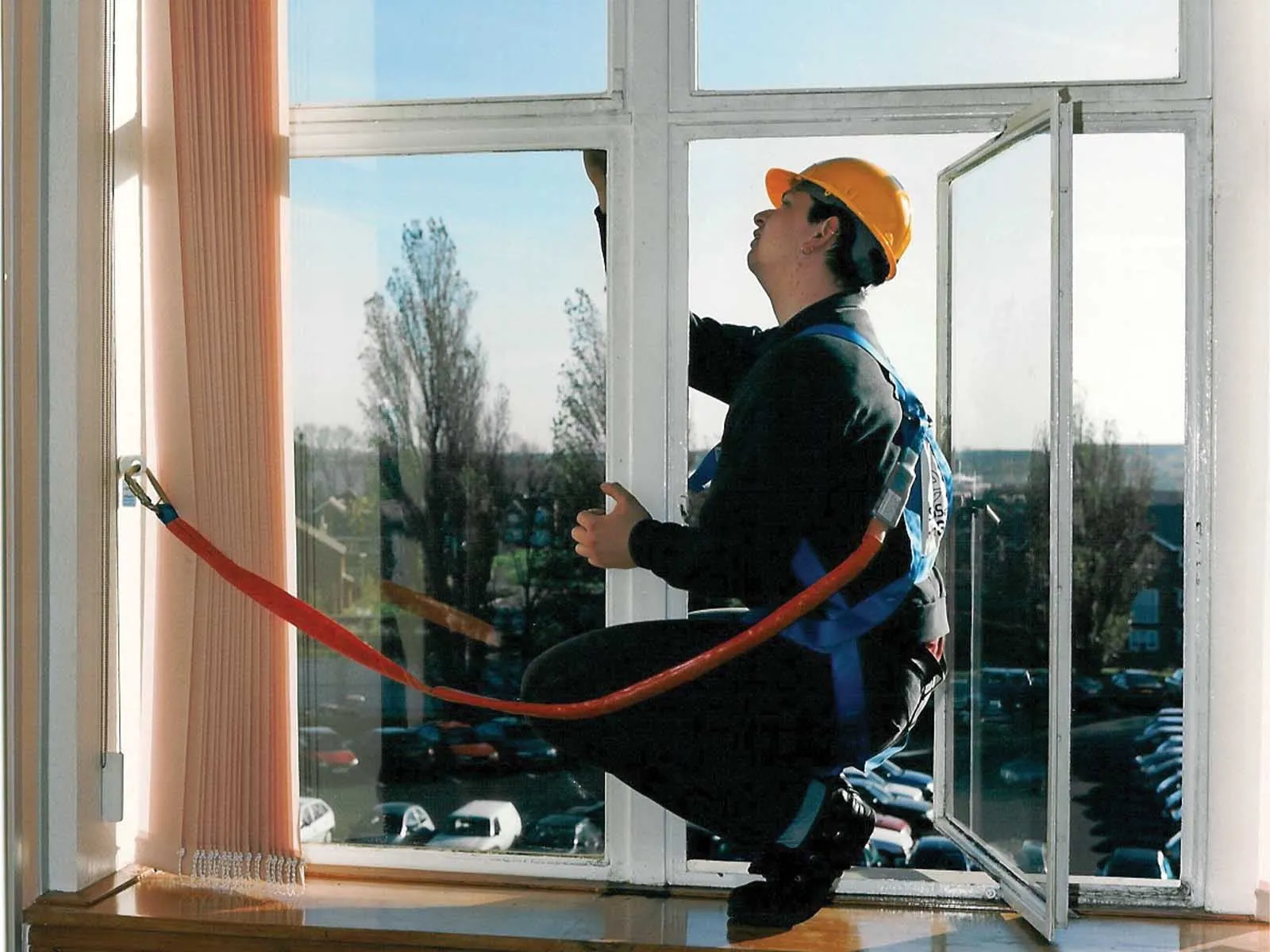 Single-point anchor installed for secure fall protection attachment