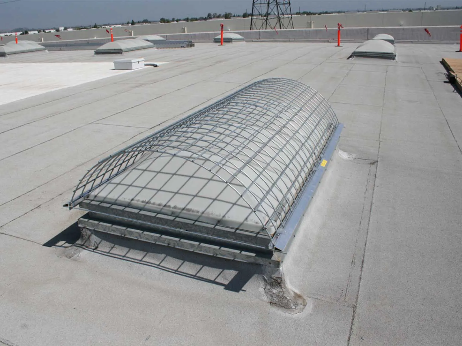Durable skylight cover installed to prevent falls and protect rooftop openings