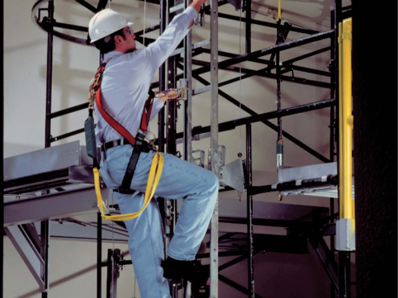 Latchways LadderLatch vertical lifeline system installed for safe ladder climbing