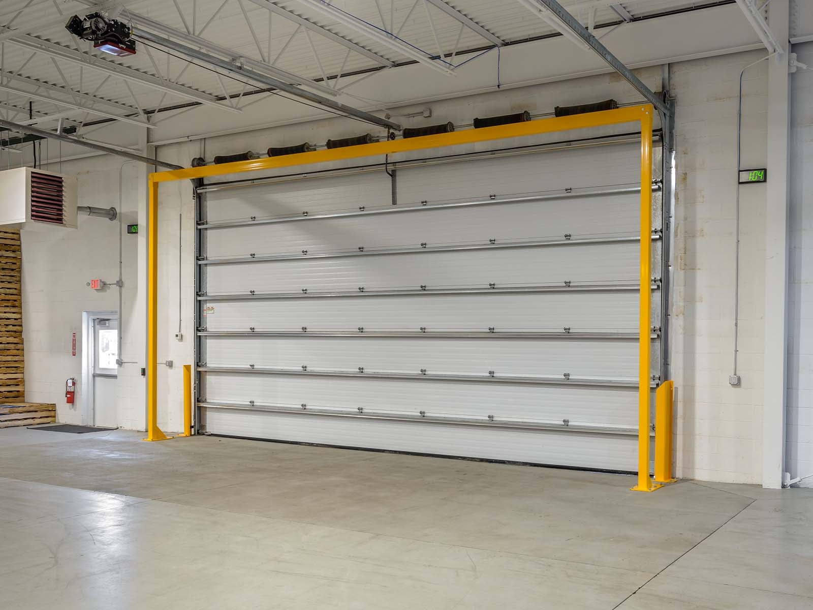 Warehouse traffic barriers installed to protect pedestrians and equipment in busy warehouse environment