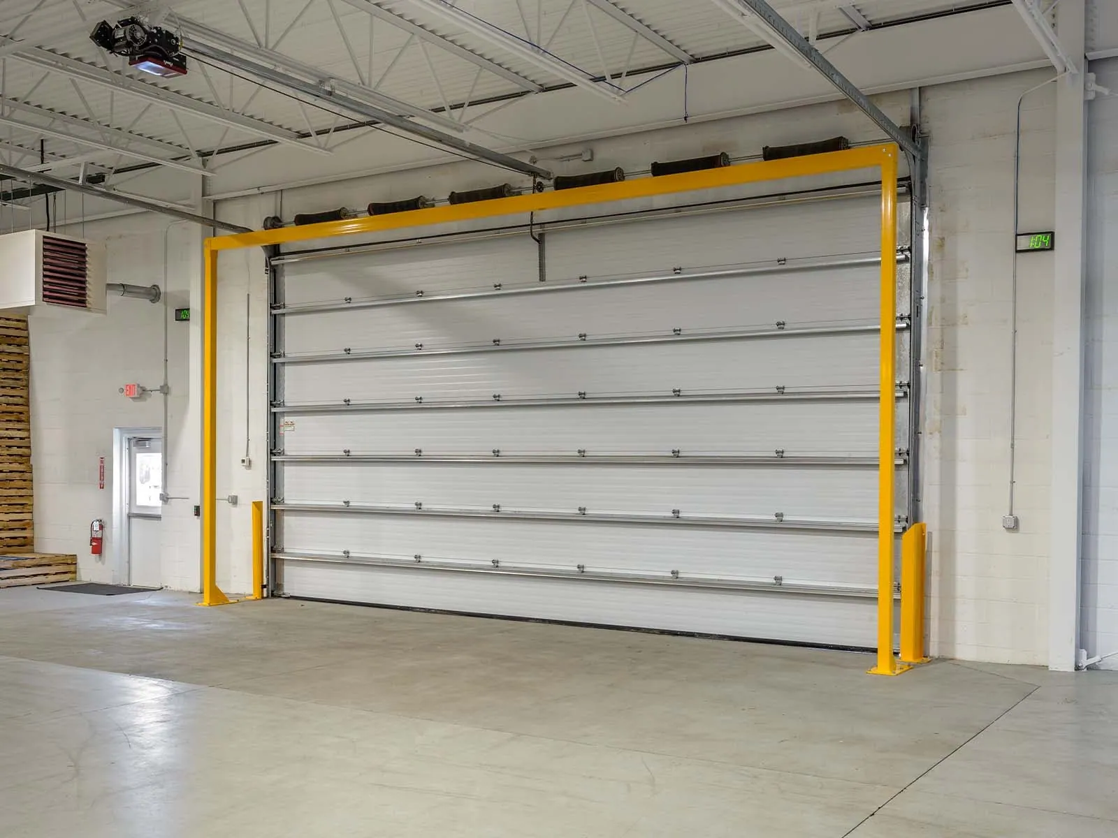 Warehouse traffic barriers installed to protect pedestrians and equipment in busy warehouse environment