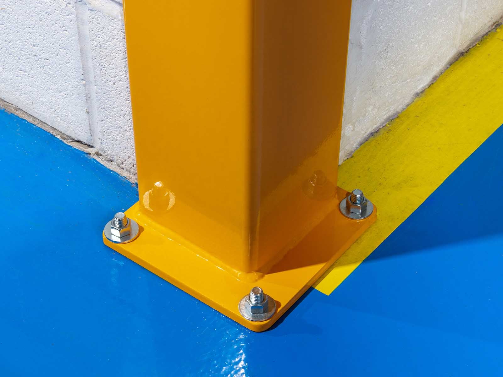 Warehouse traffic barriers installed to protect pedestrians and equipment in busy warehouse environment