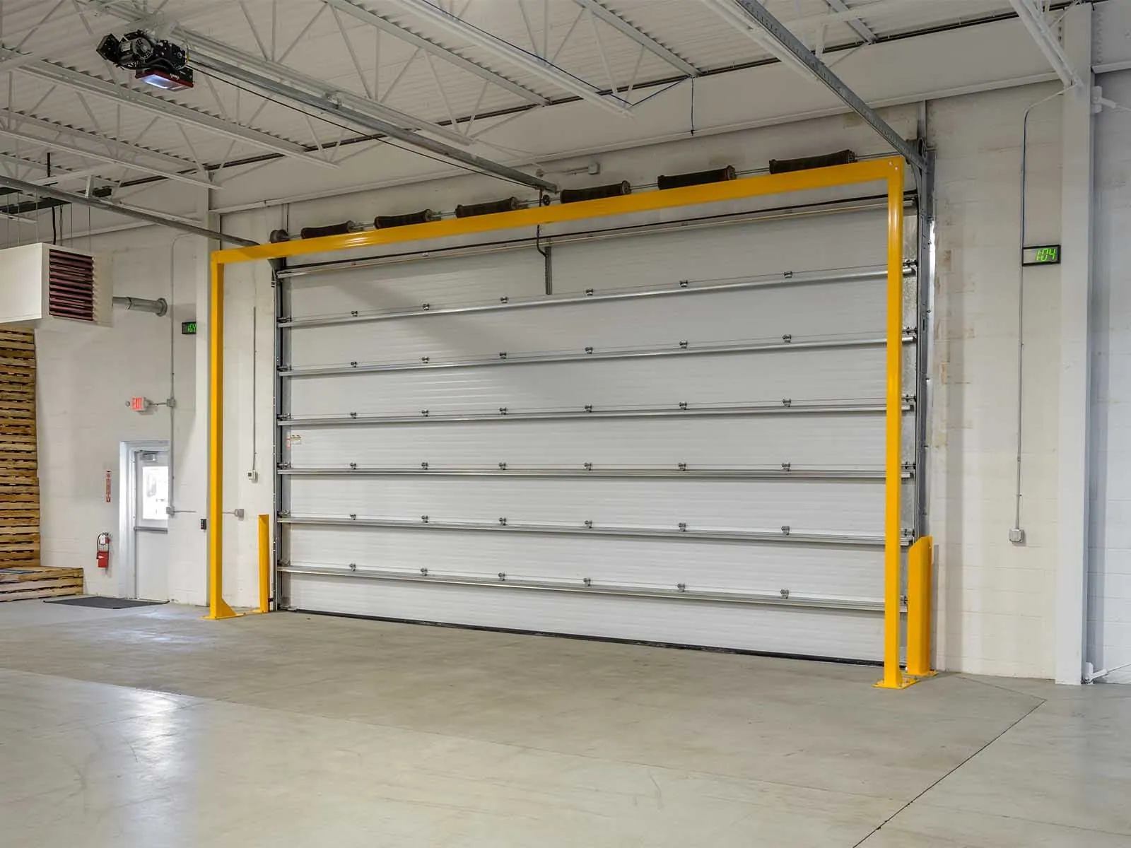 Warehouse traffic barriers installed to protect pedestrians and equipment in busy warehouse environment