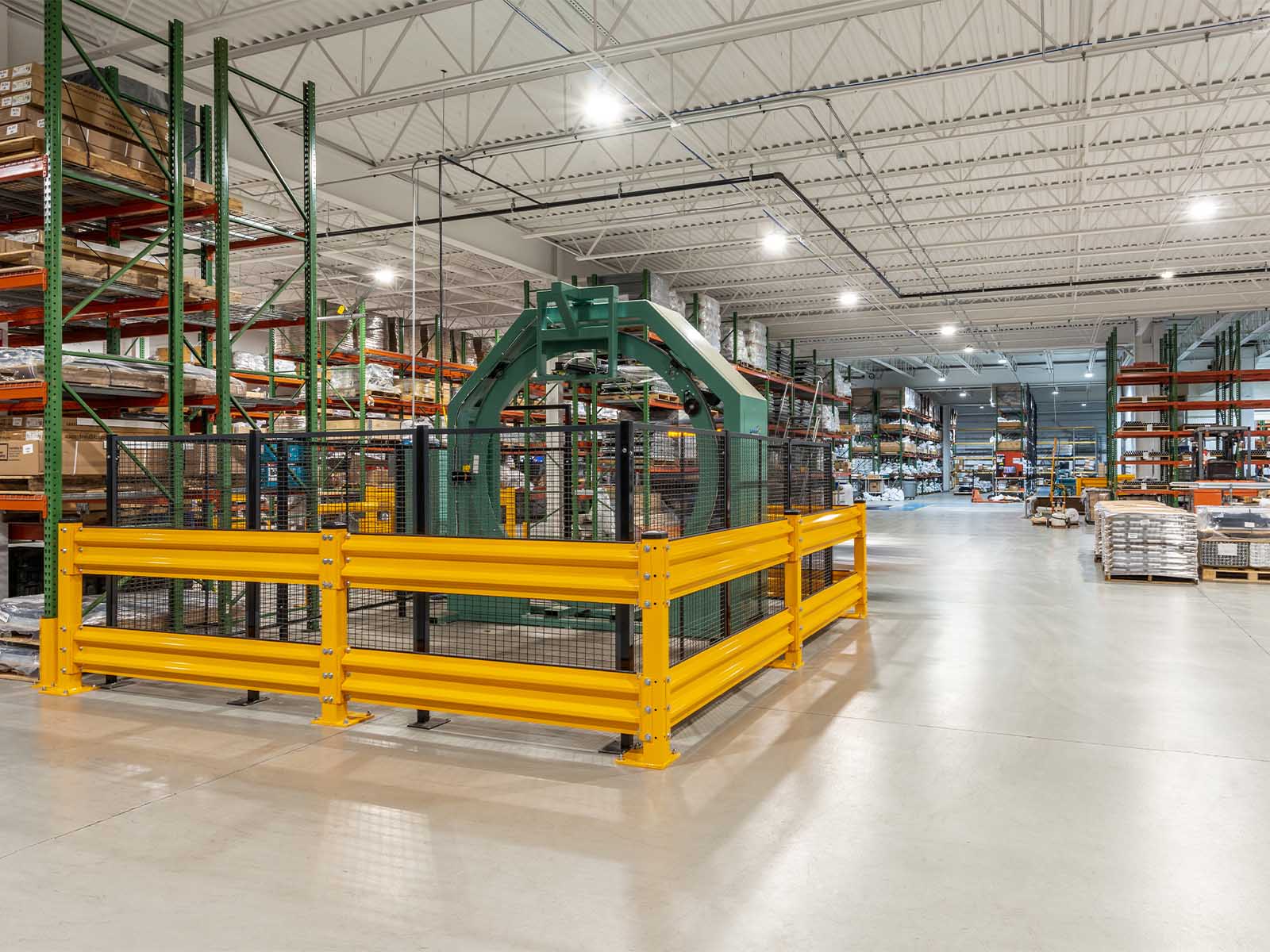 Warehouse traffic barriers installed to protect pedestrians and equipment in busy warehouse environment